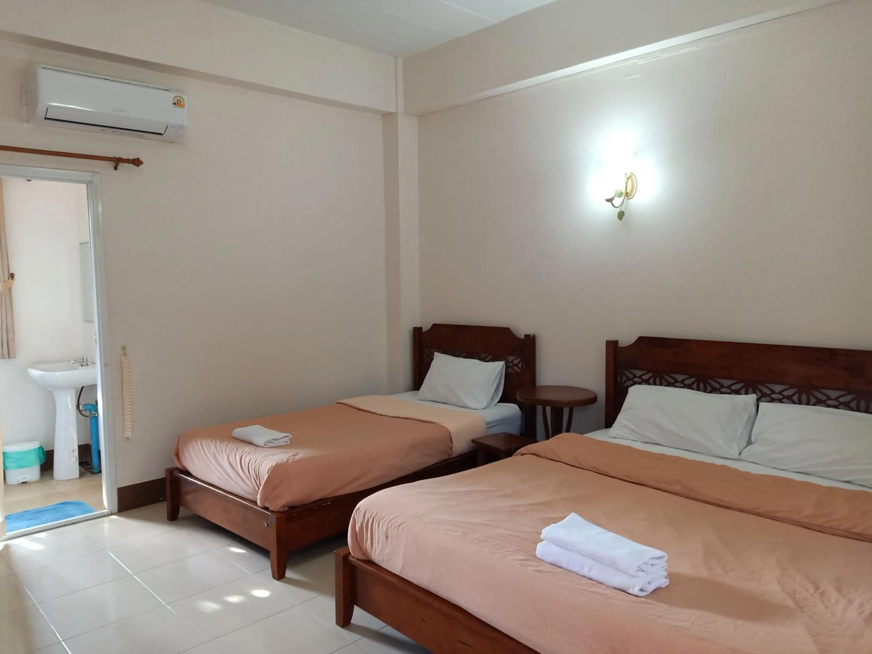 Bed in Phumchan Place Hotel