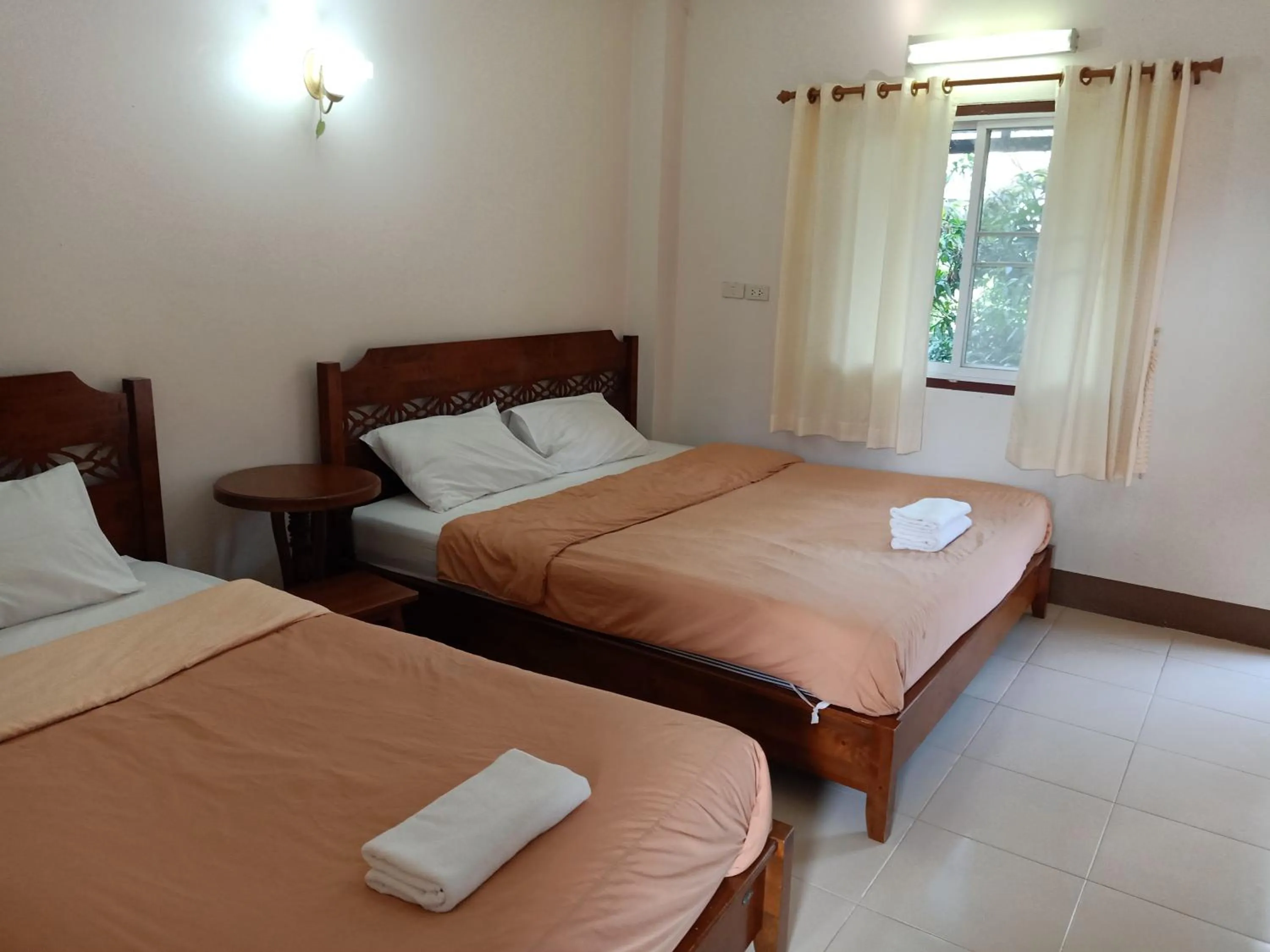 Bed in Phumchan Place Hotel