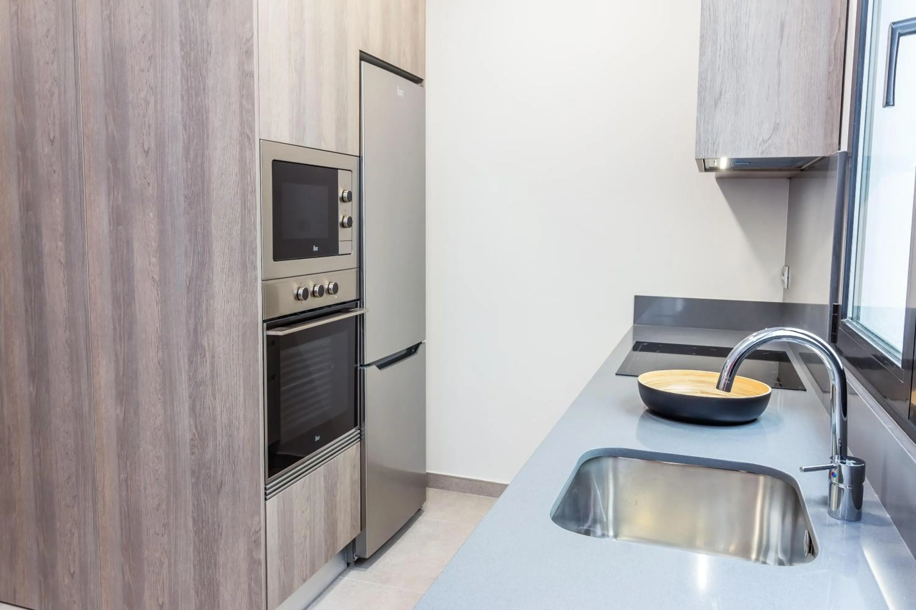 Kitchen or kitchenette in URBANSEA Holiday Homes