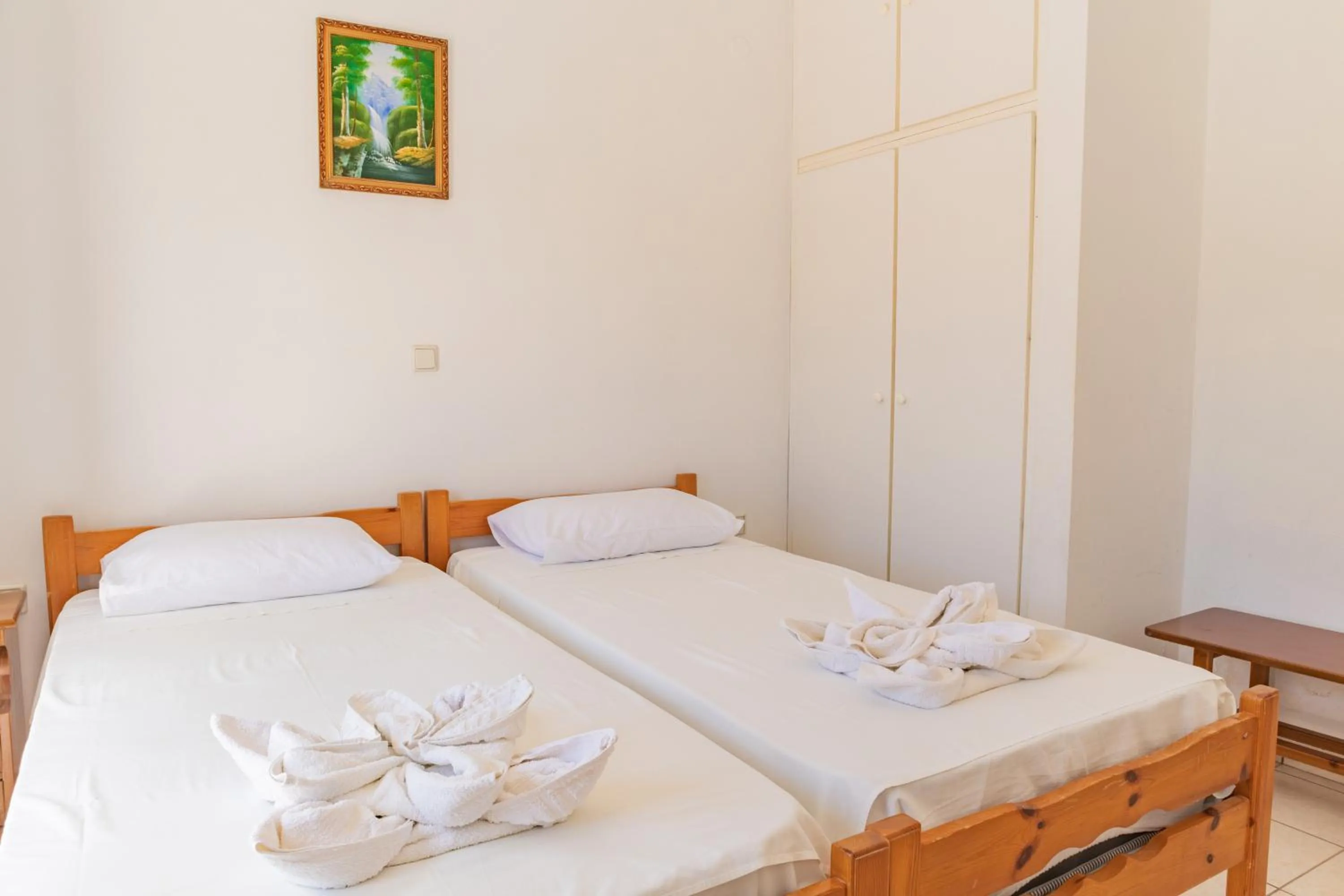 Bed in Amazona Apartments and Studios