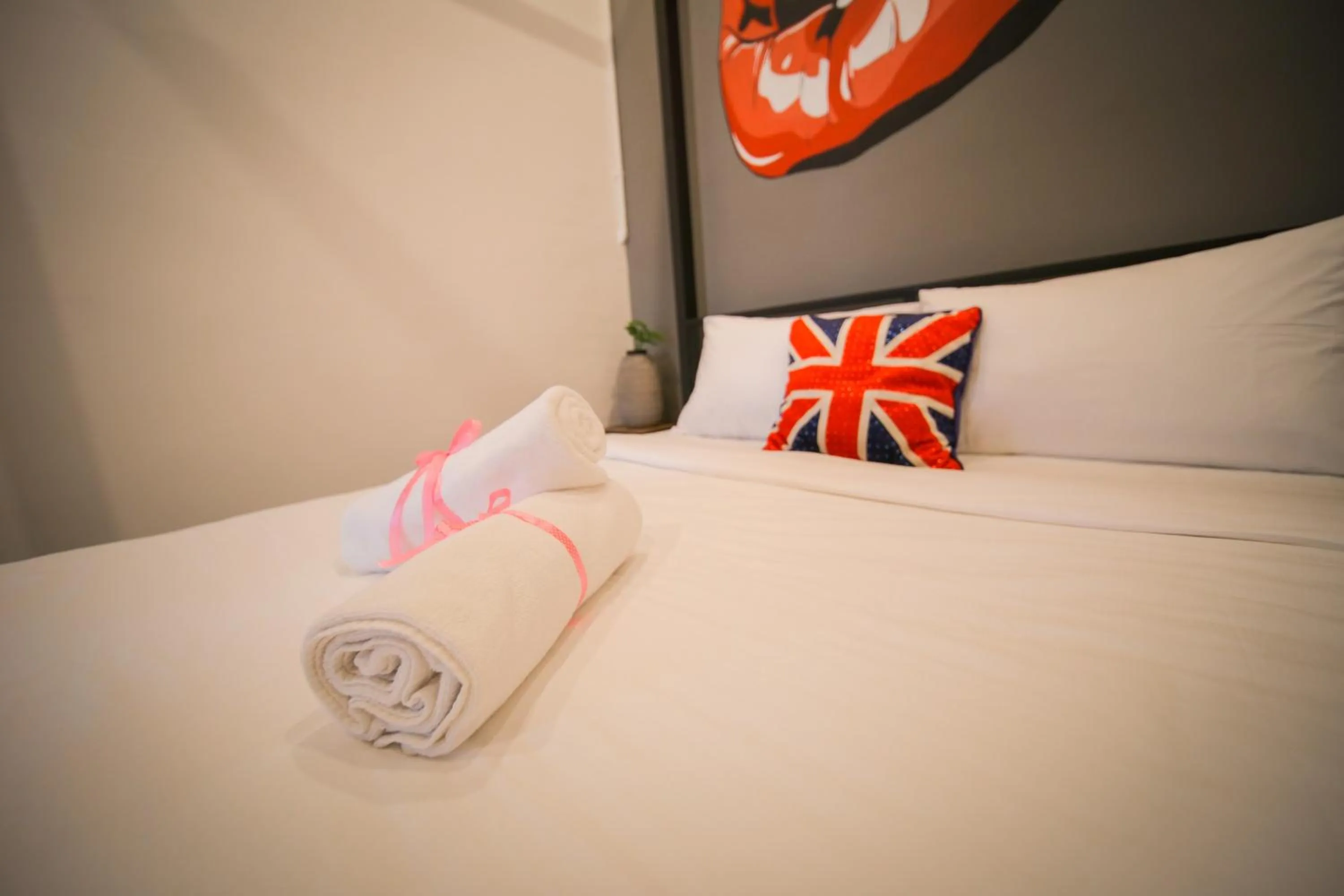 towels, Bed in The Best Hotel in Bayan Lepas - THE LOV PENANG