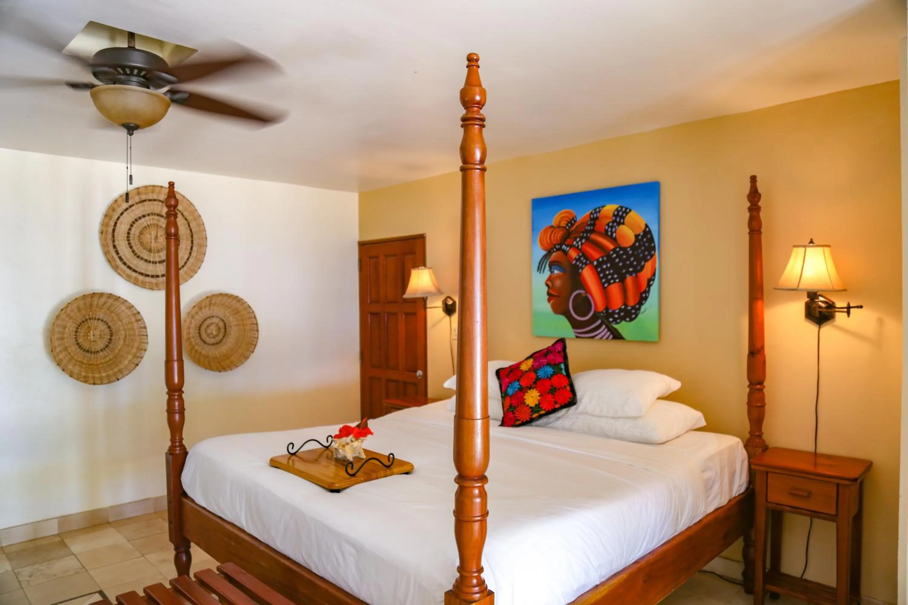 Bed in The Colonial at Jaguar Reef