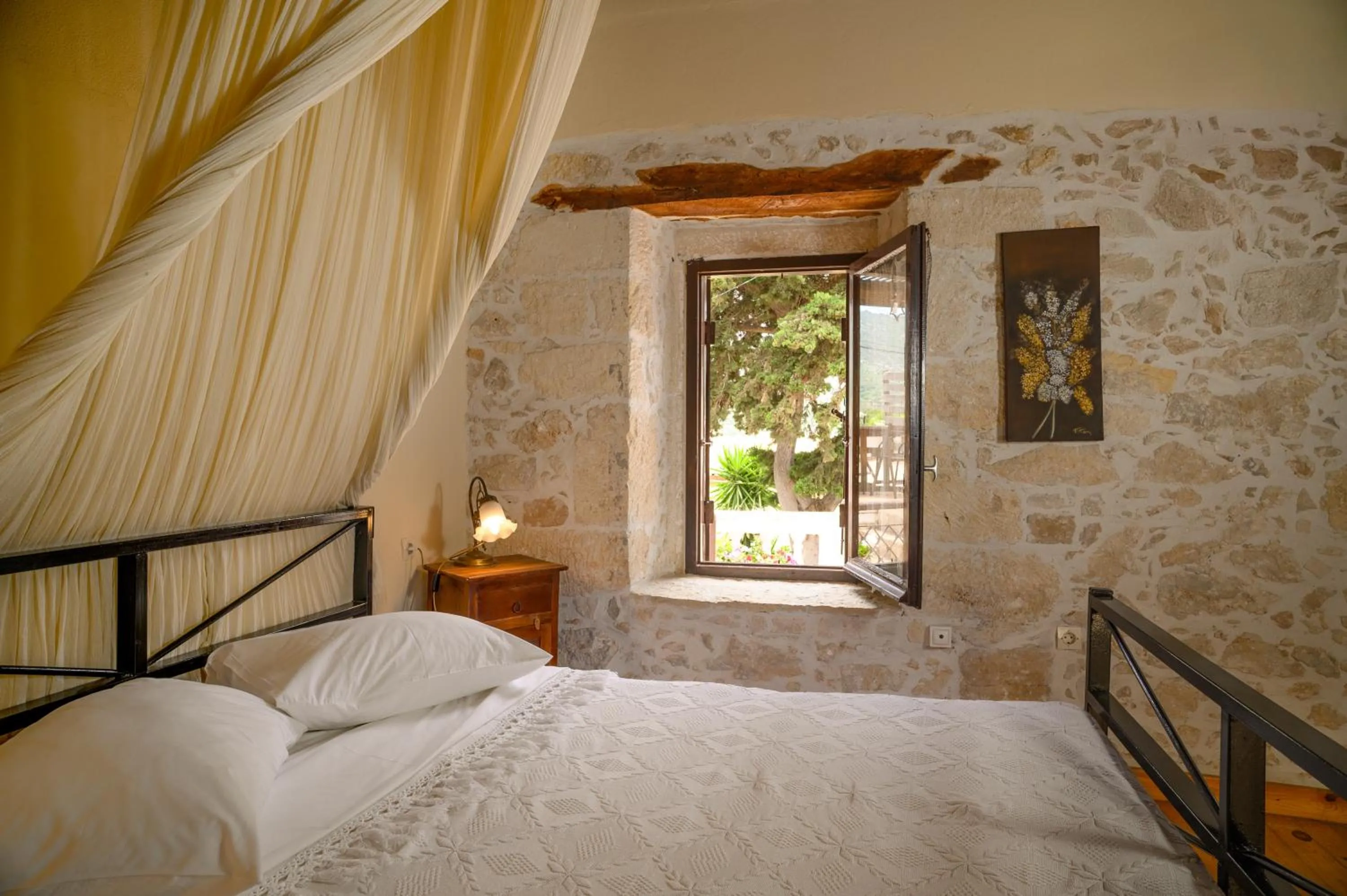 Bed in Troullos Traditional Homes
