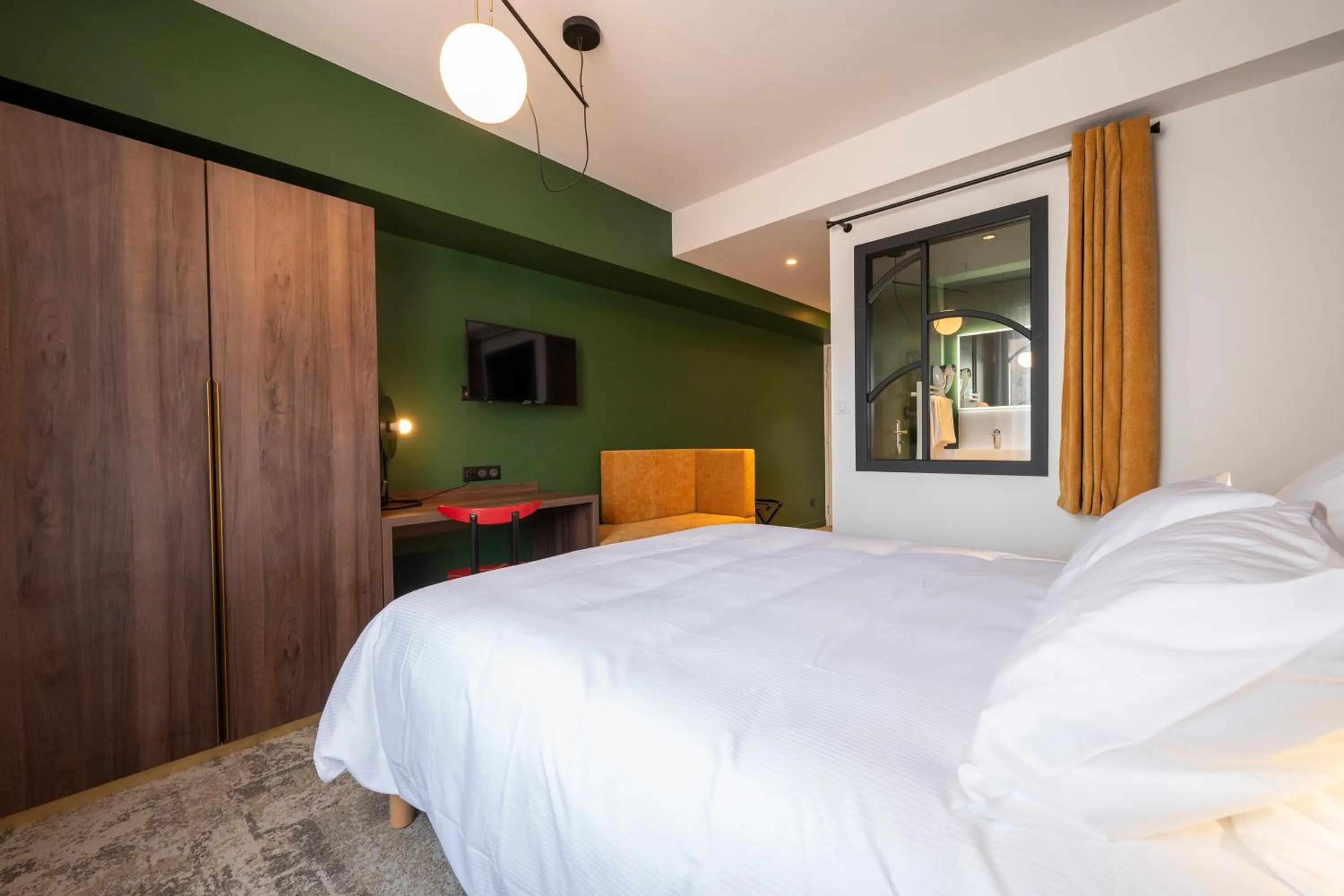 Bed in Hôtel Les Pins - Oléron