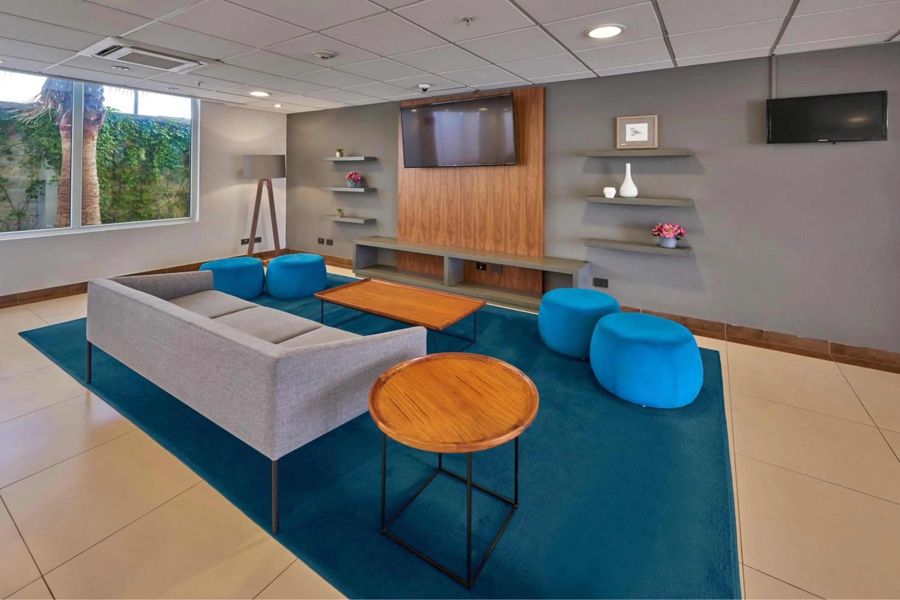 Living room in City Express by Marriott Queretaro Jurica