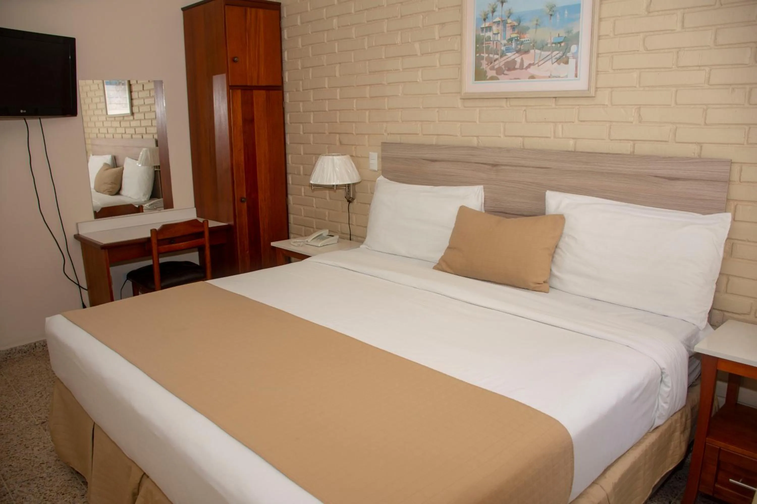 Bed in Hotel Mac Arthur