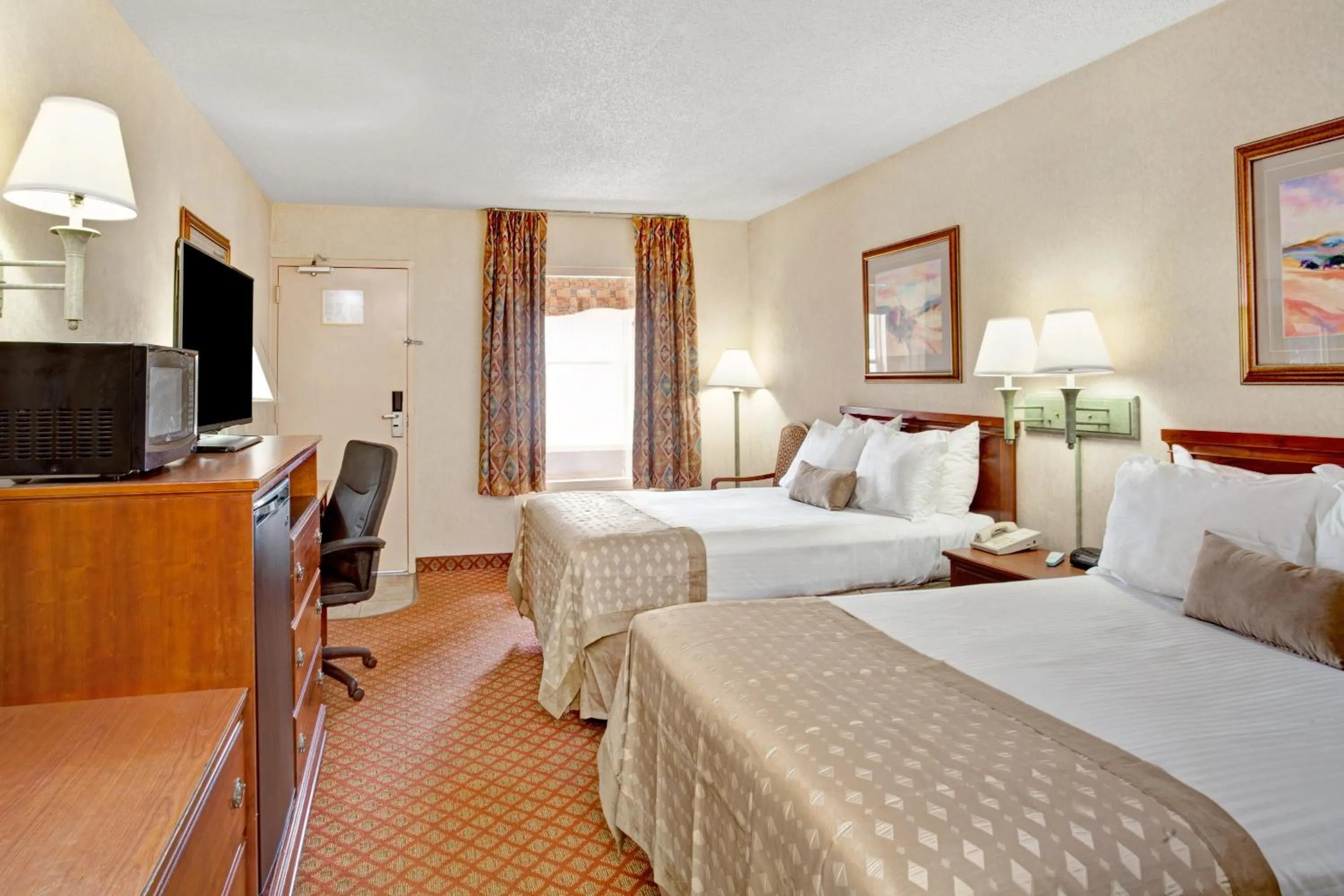 Bedroom, Bed in Ramada by Wyndham West Memphis