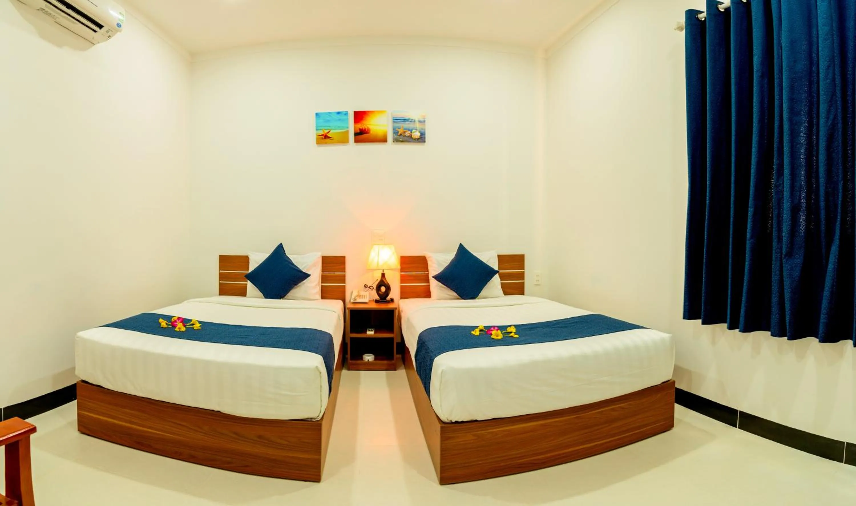 Bed in PHAM GIA HOTEL Mui Ne
