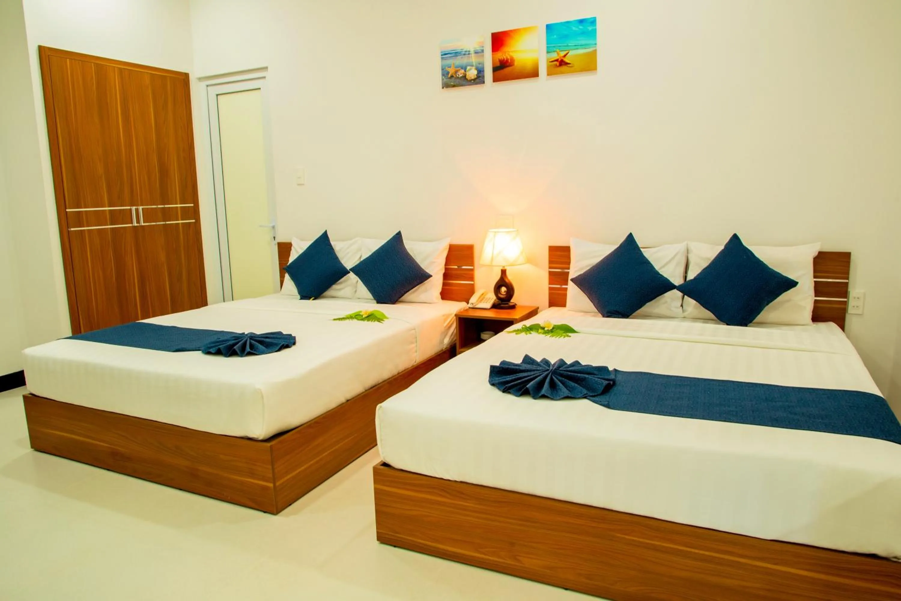 Bed in PHAM GIA HOTEL Mui Ne