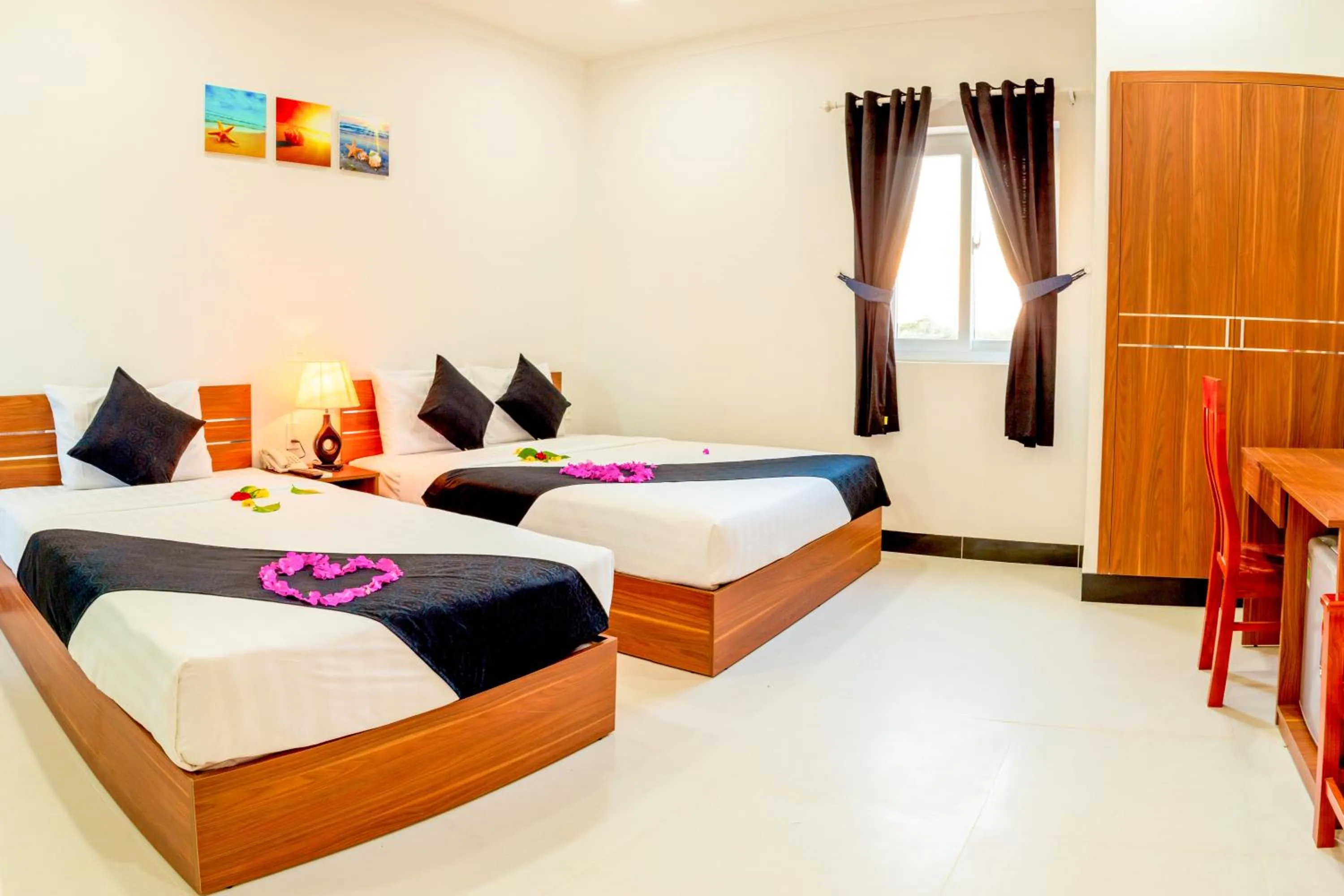 Bed in PHAM GIA HOTEL Mui Ne