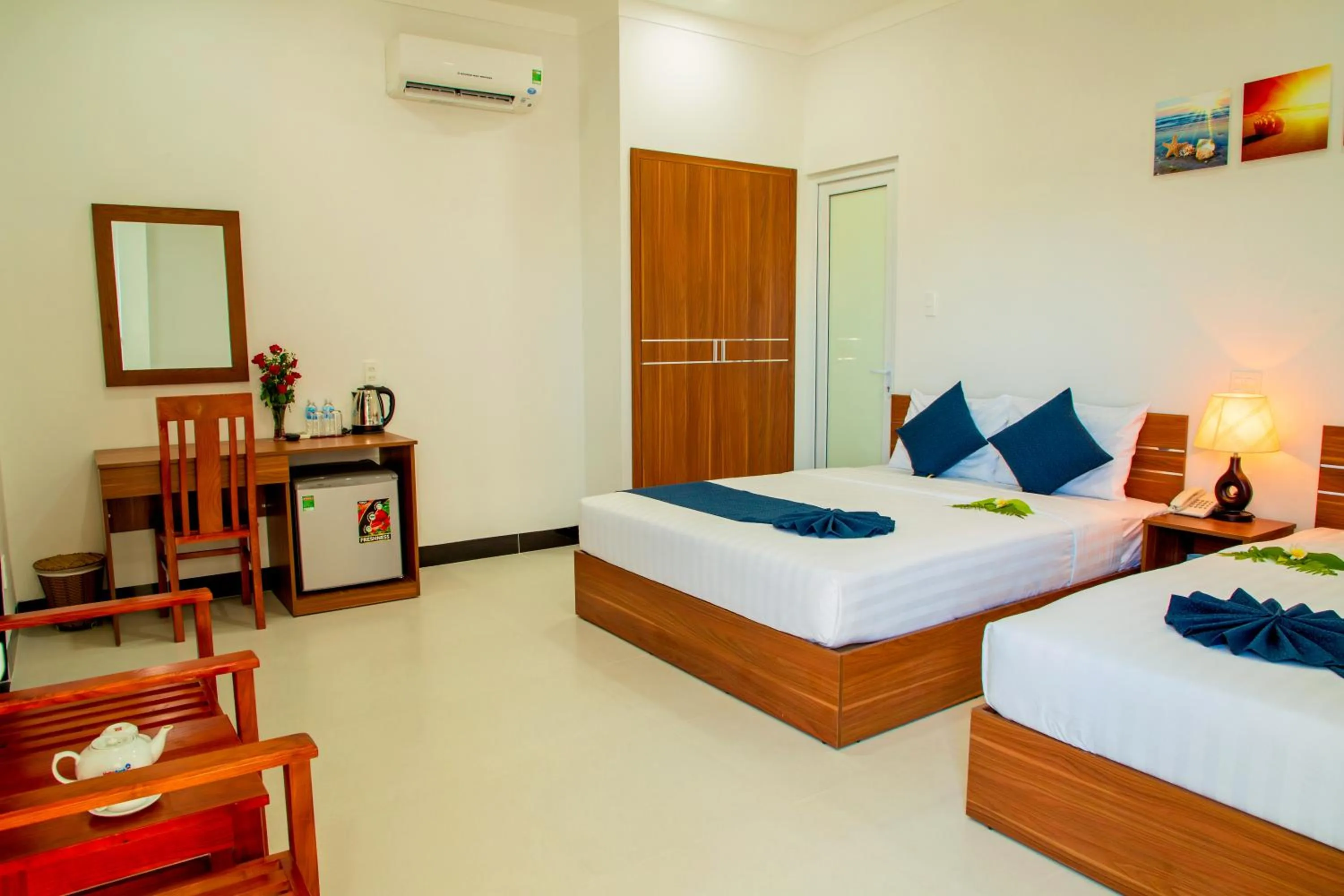 Bed in PHAM GIA HOTEL Mui Ne