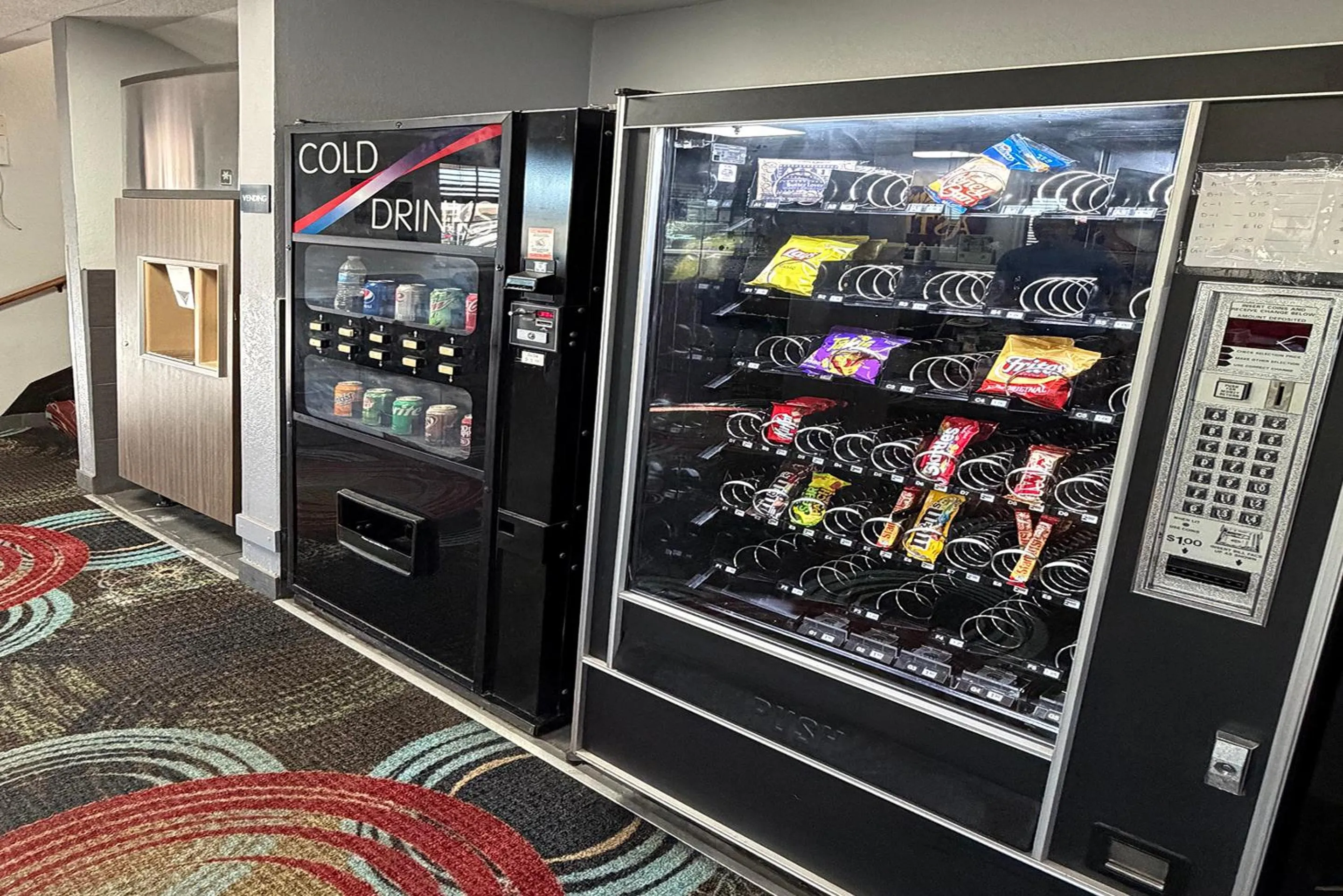 vending machine in Coratel Inn and Suites by Jasper Stillwater