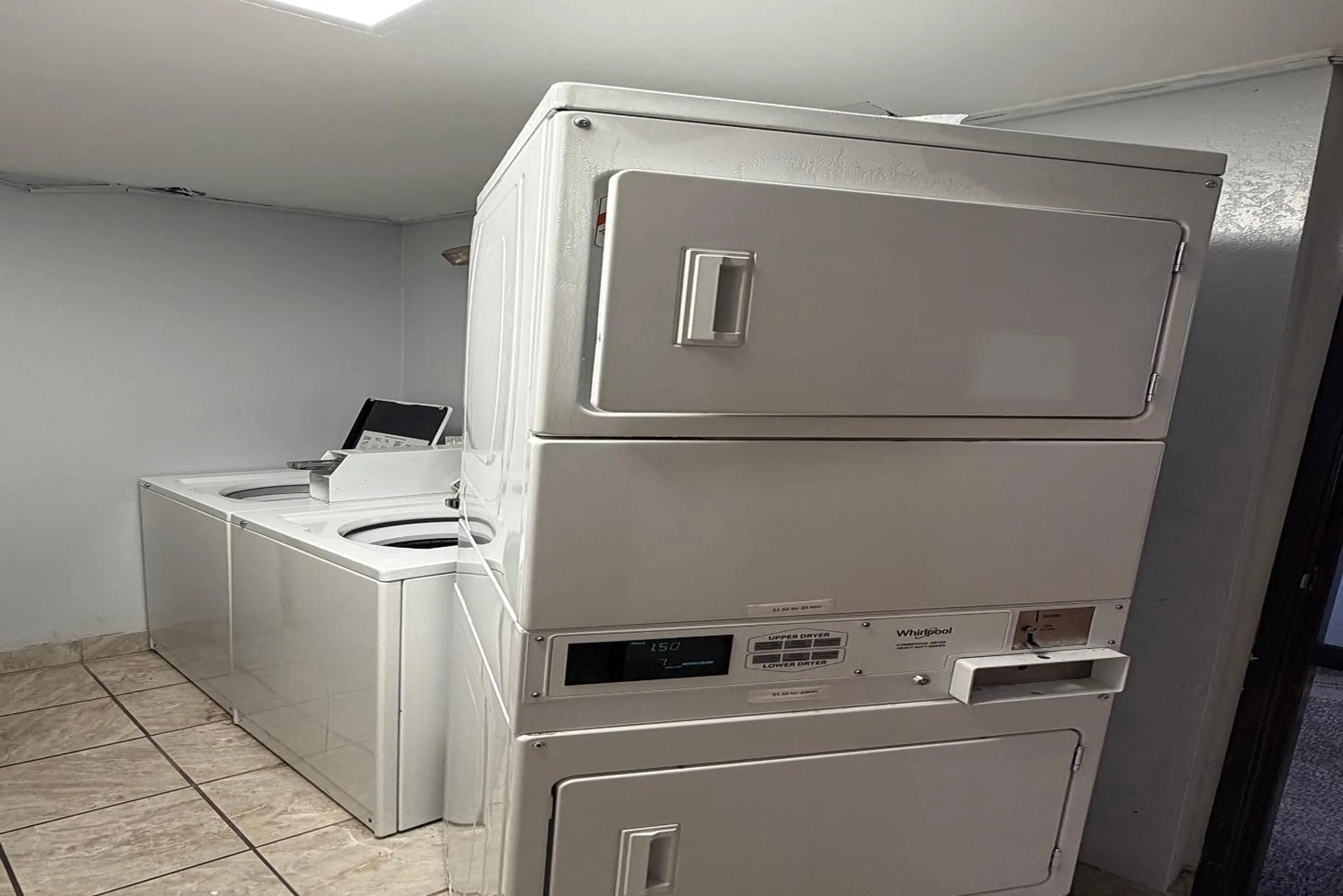 laundry in Coratel Inn and Suites by Jasper Stillwater