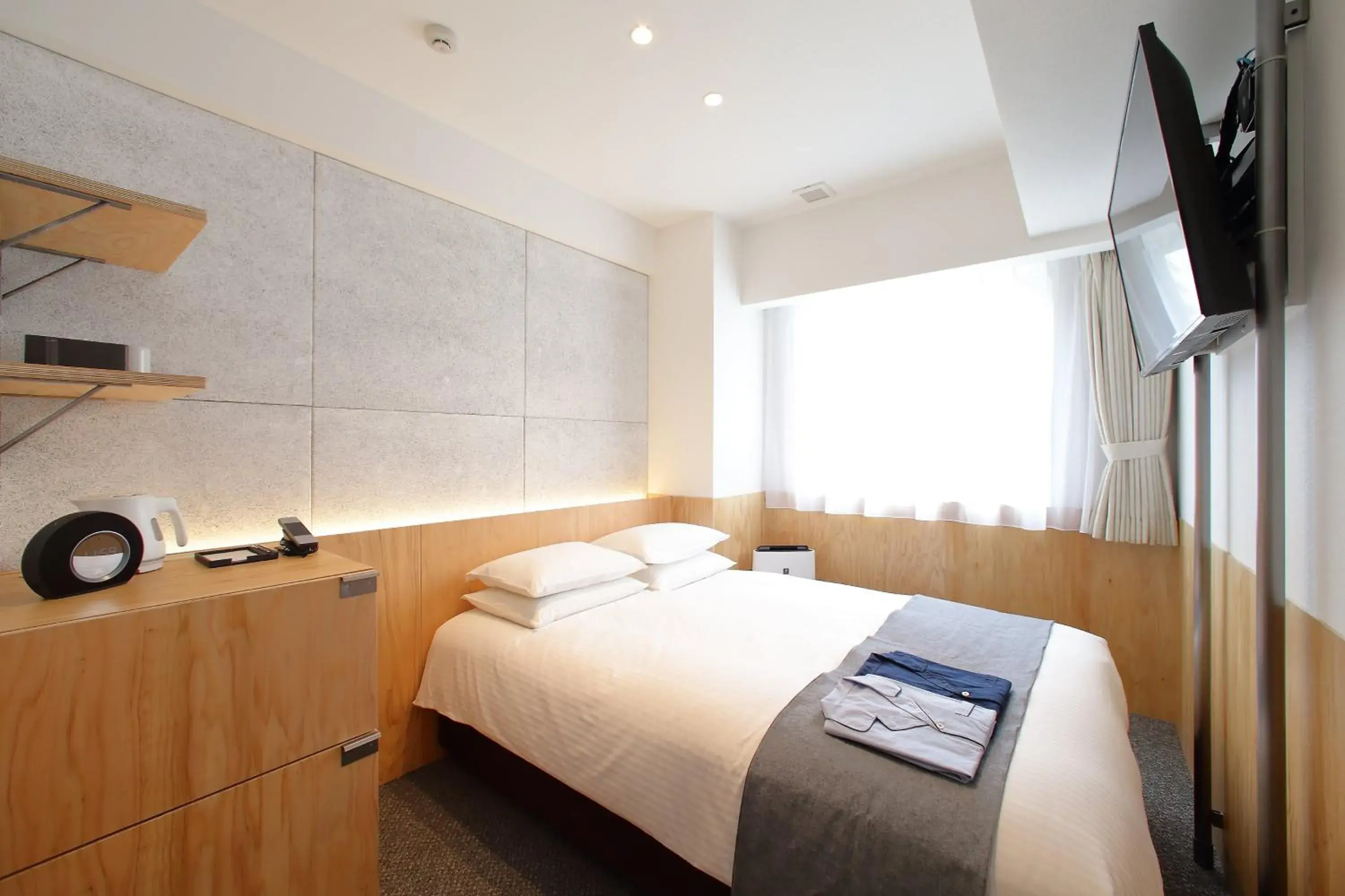 Bed in Hotel Oriental Express Tokyo Kamata Bed in Hotel Oriental Express Tokyo Kamata