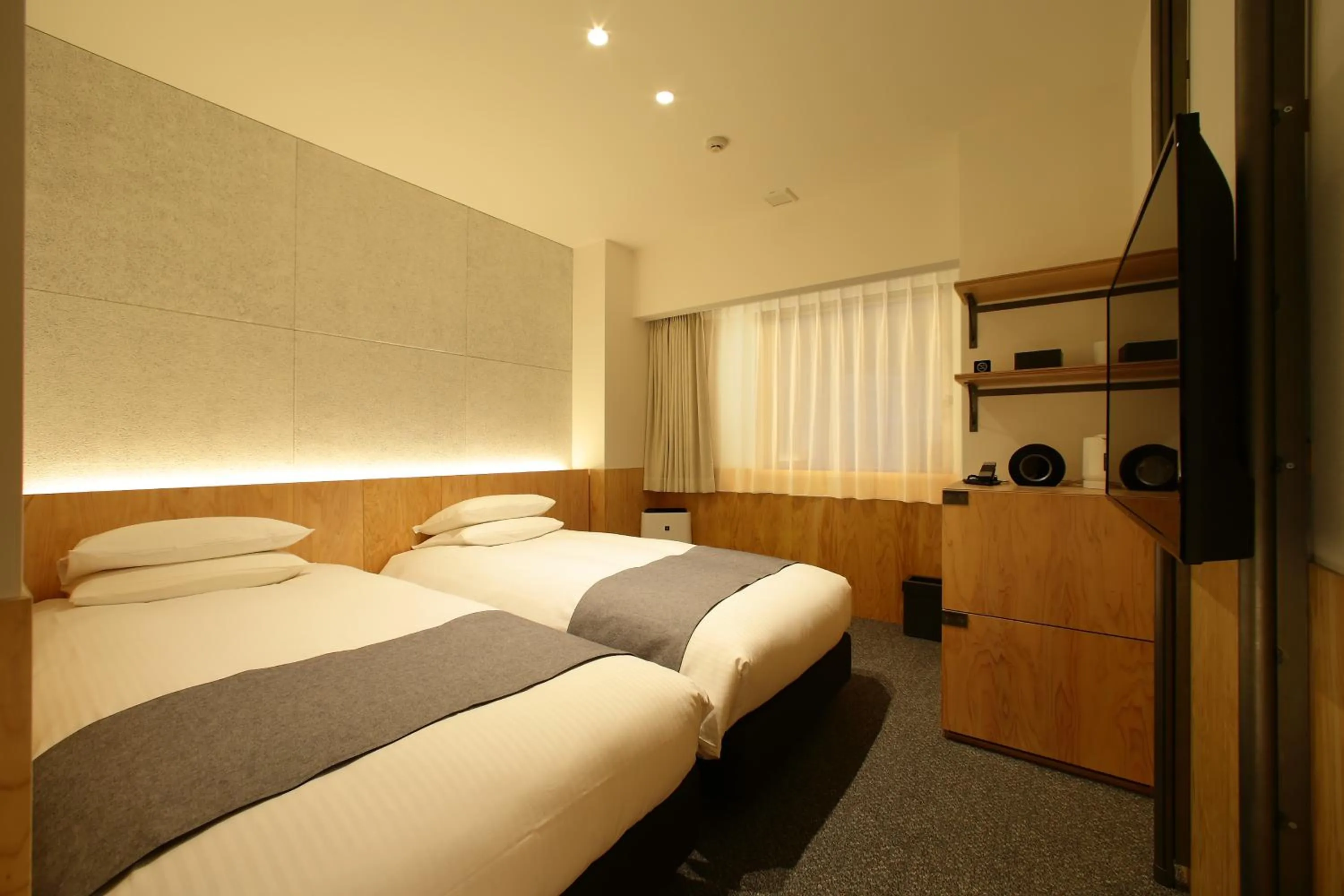 Bed in Hotel Oriental Express Tokyo Kamata