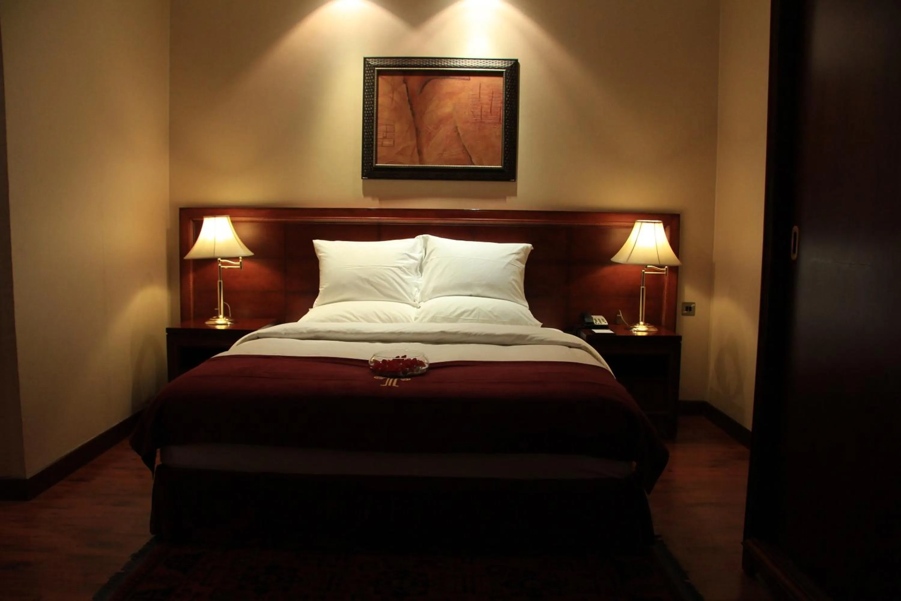 Bed in TRIANON ROYAL HOTEL