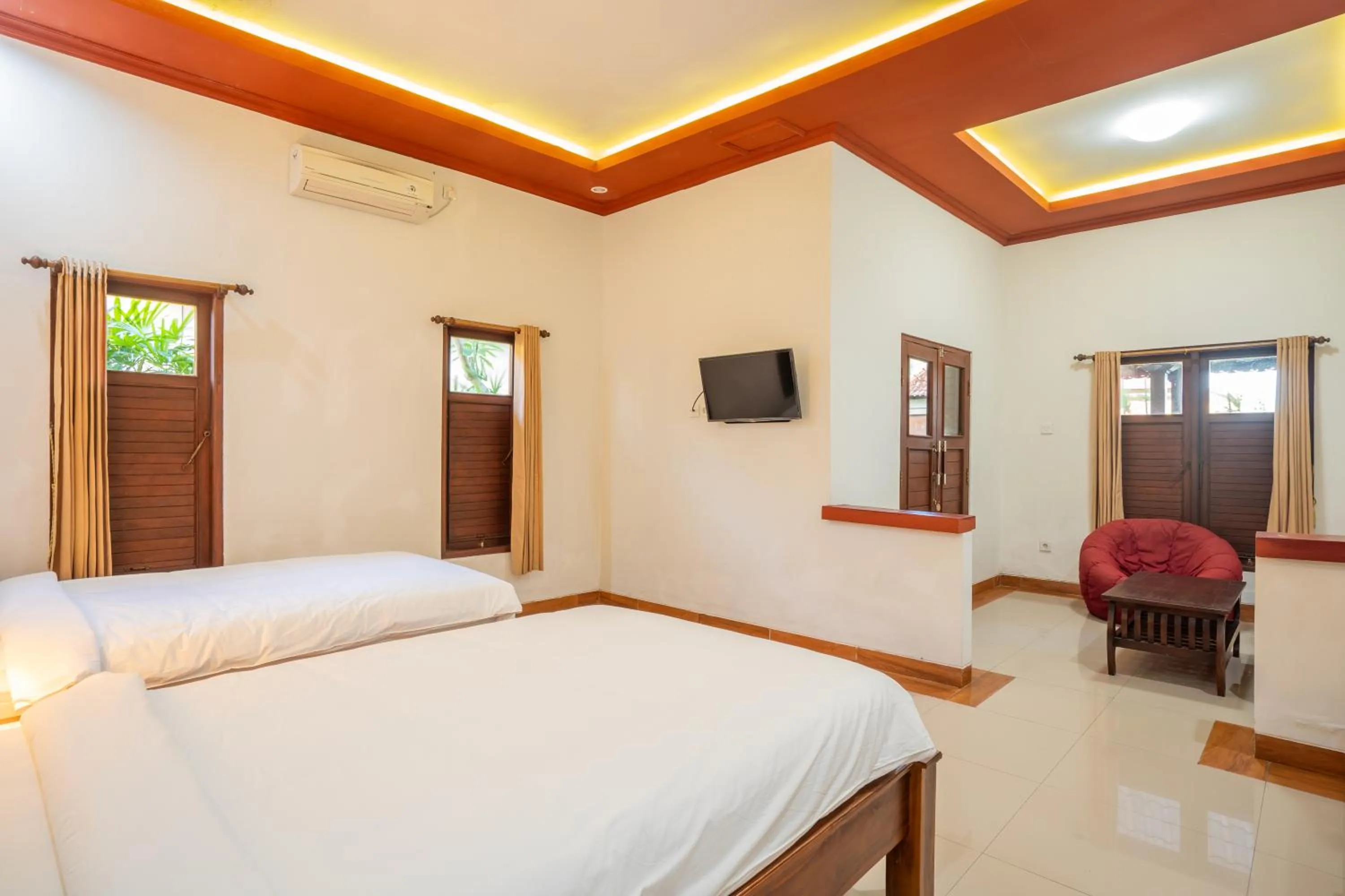 Bed in Nirmala Guest House Surf Keramas