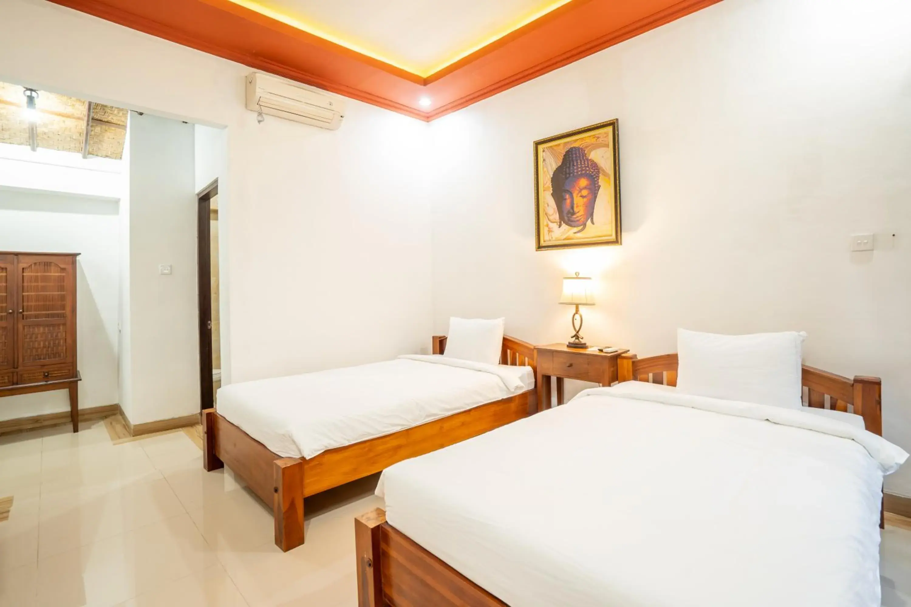 Bed in Nirmala Guest House Surf Keramas Bed in Nirmala Guest House Surf Keramas