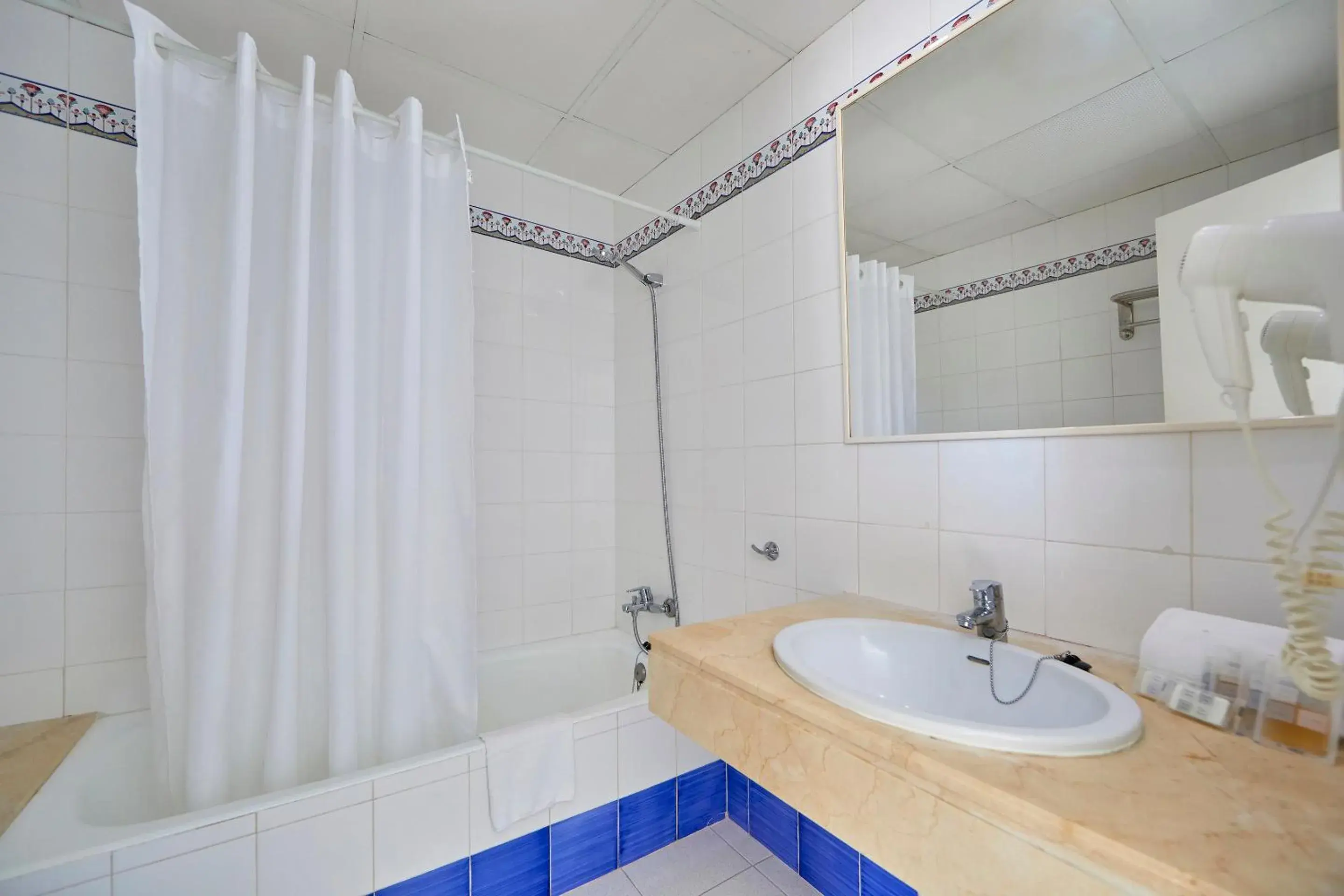 Bathroom in Gavimar Ariel Chico Hotel and Apartments Bathroom in Gavimar Ariel Chico Hotel and Apartments