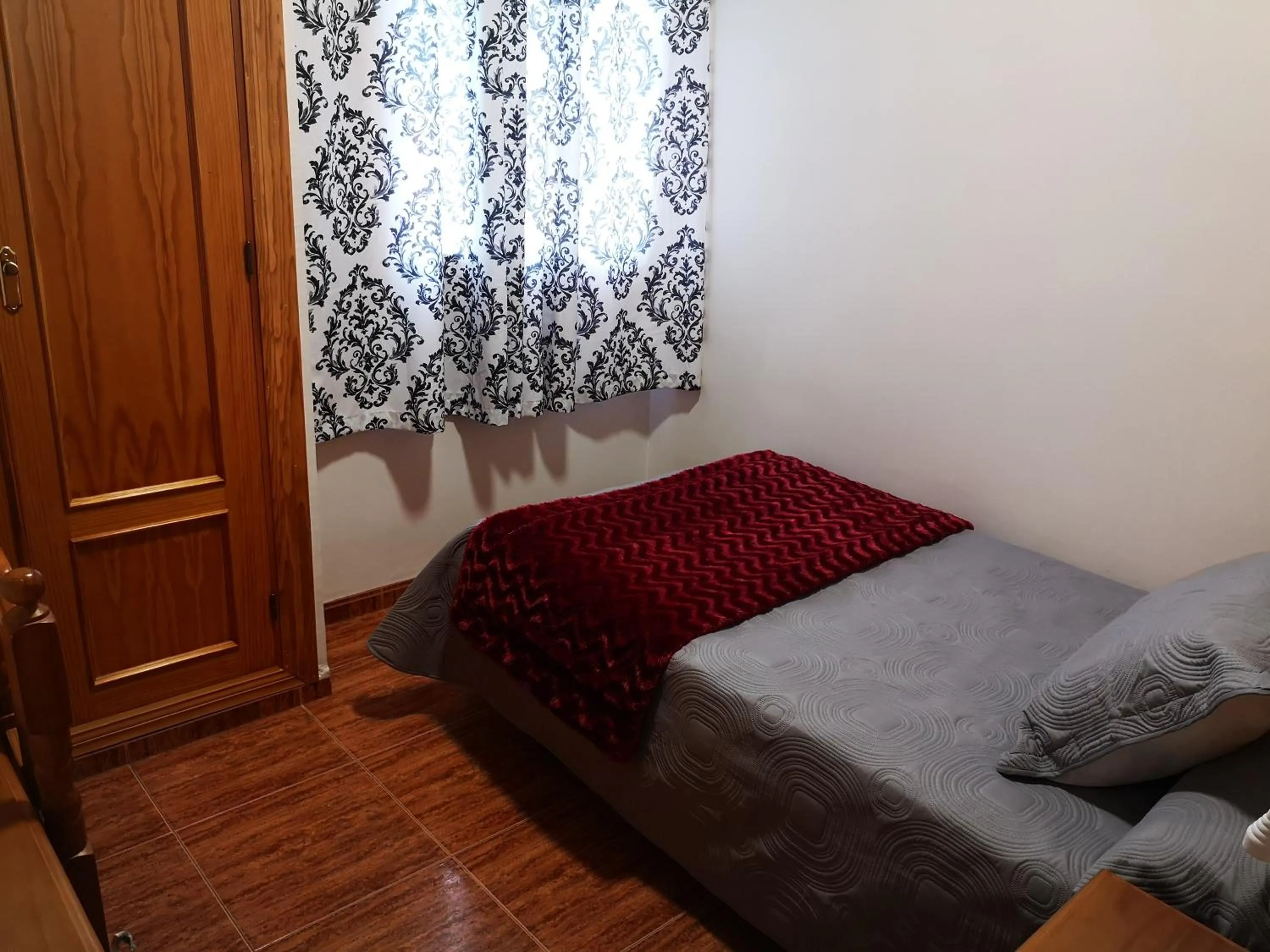Bed in Hostal Los Hermanos