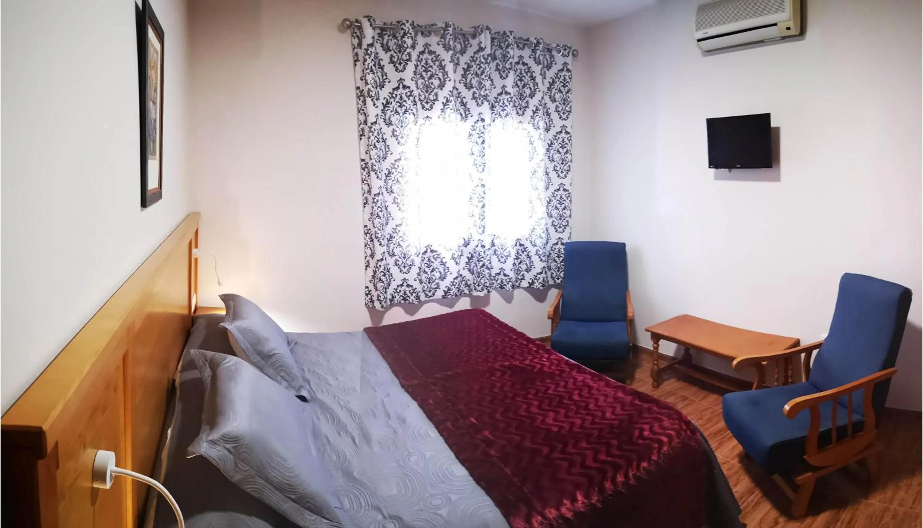 Bed in Hostal Los Hermanos