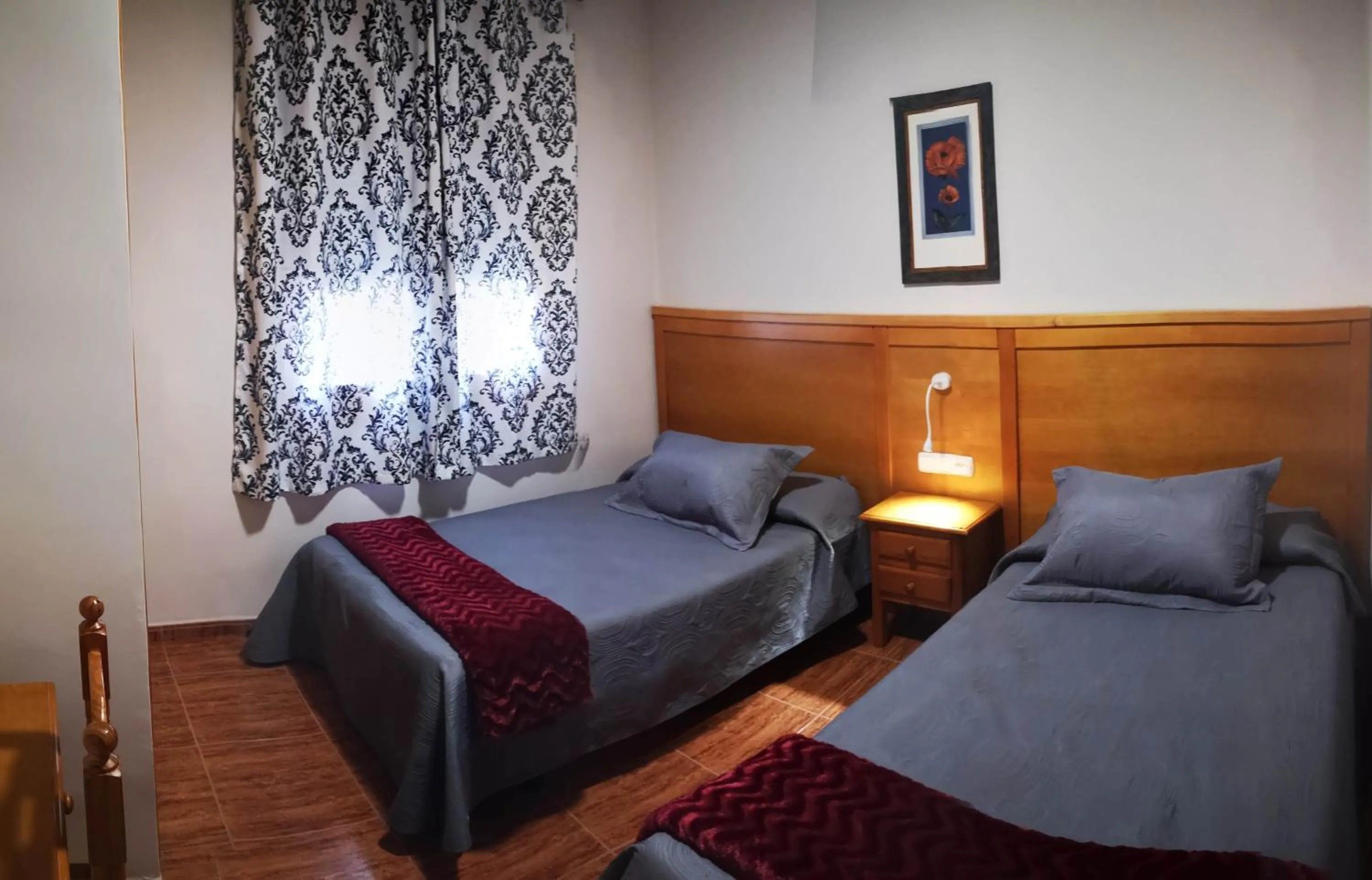 Bed in Hostal Los Hermanos