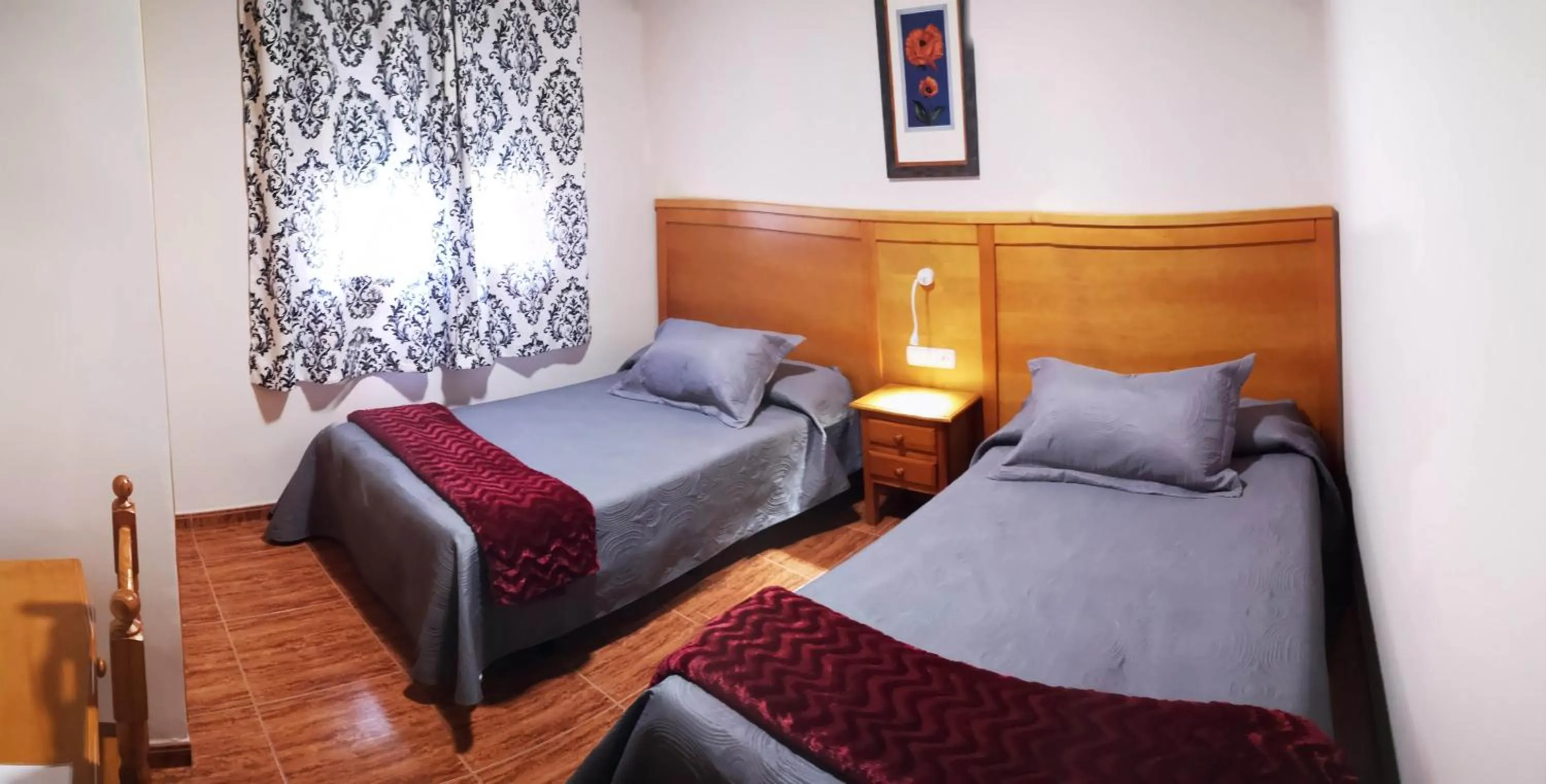 Bed in Hostal Los Hermanos