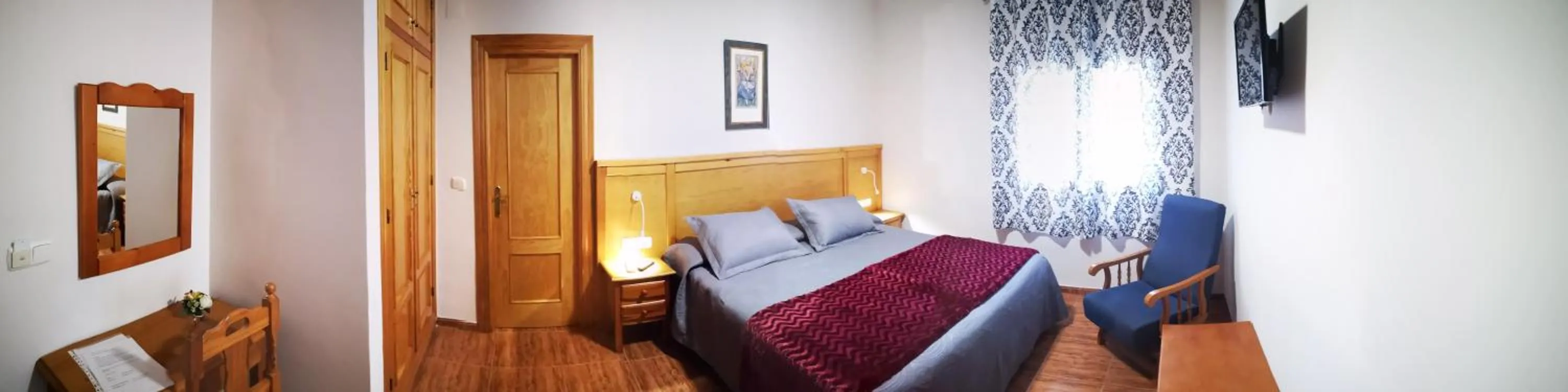 Bed in Hostal Los Hermanos