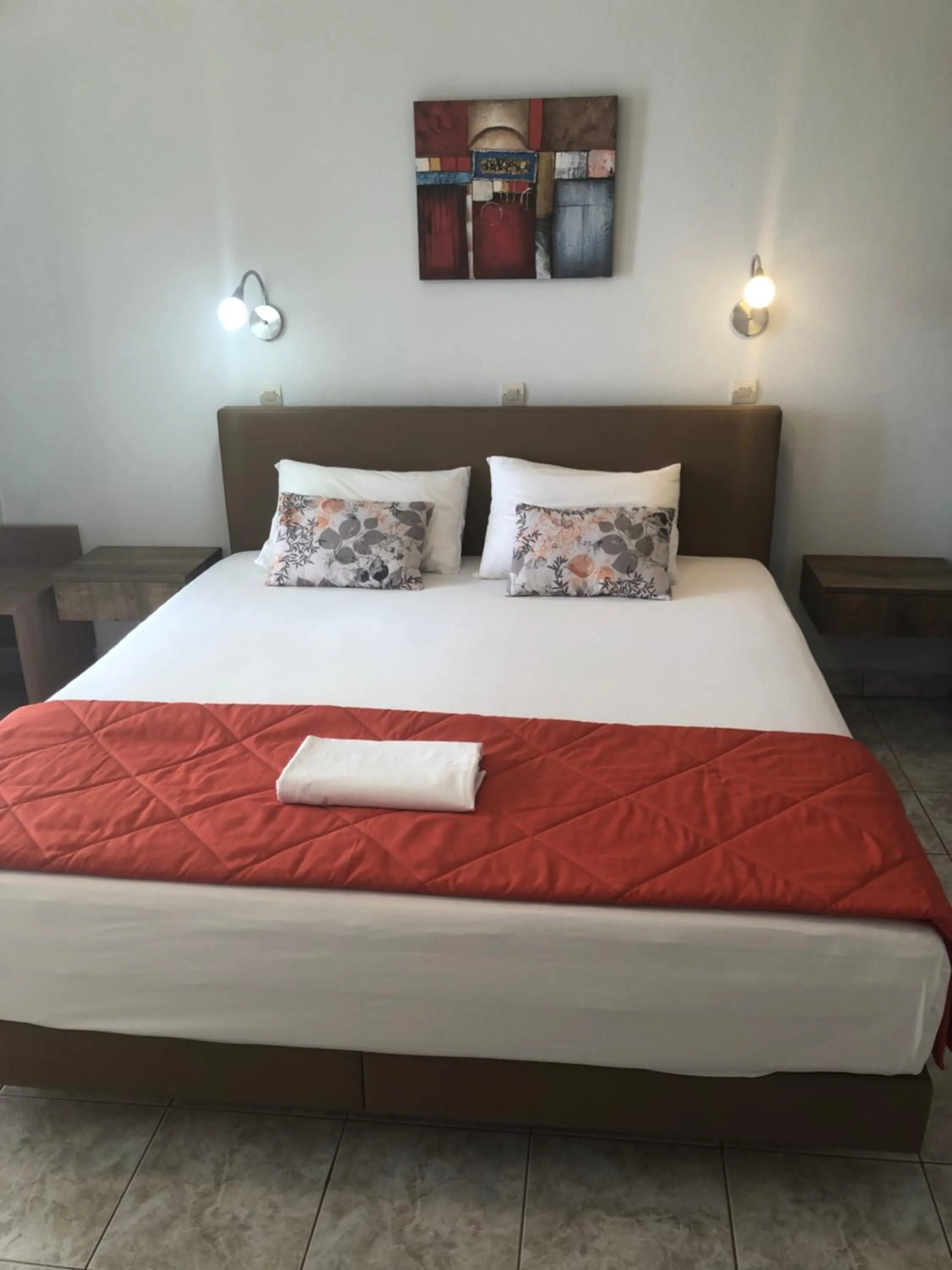 Bed in Chrisanthi Studios & Apartments