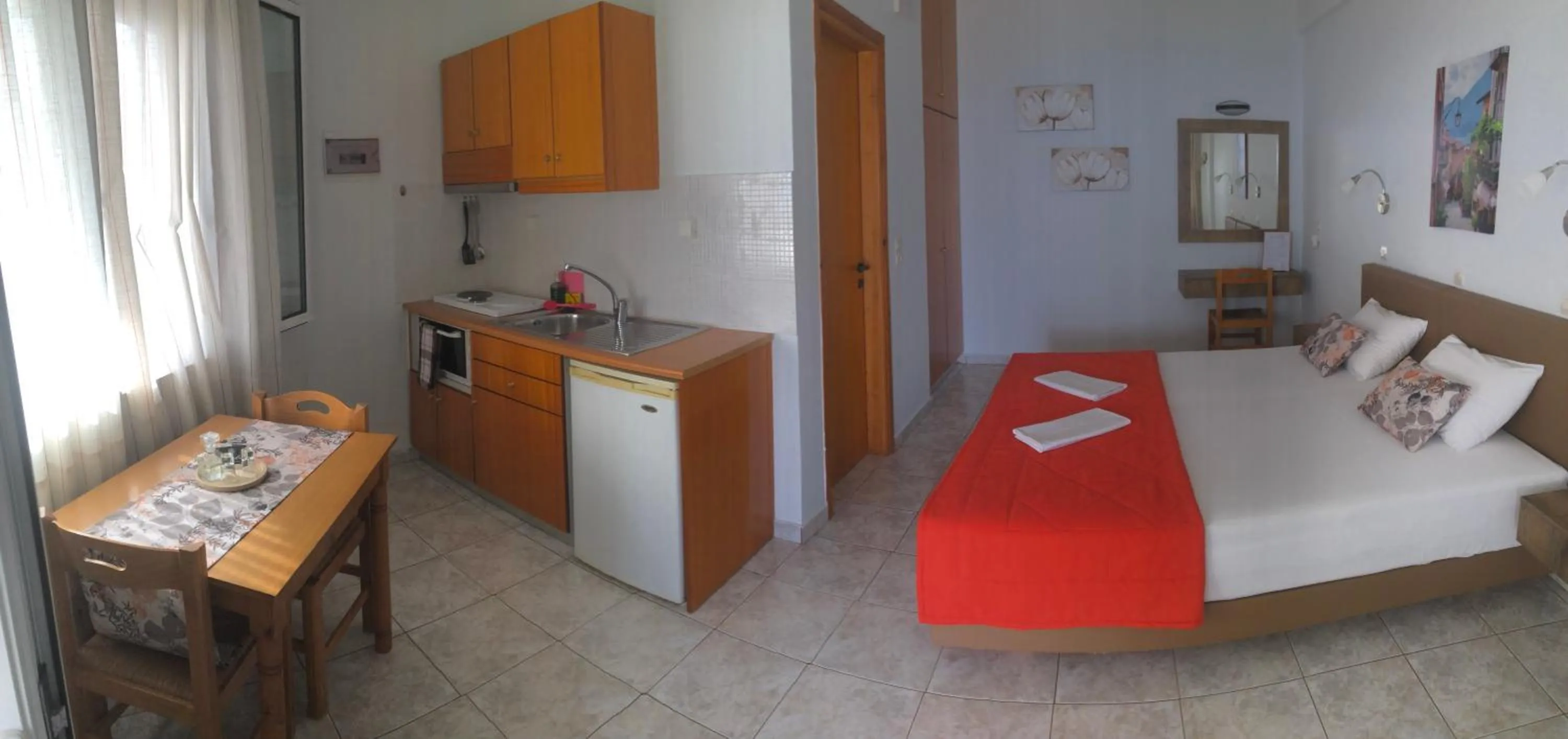 Bed in Chrisanthi Studios & Apartments