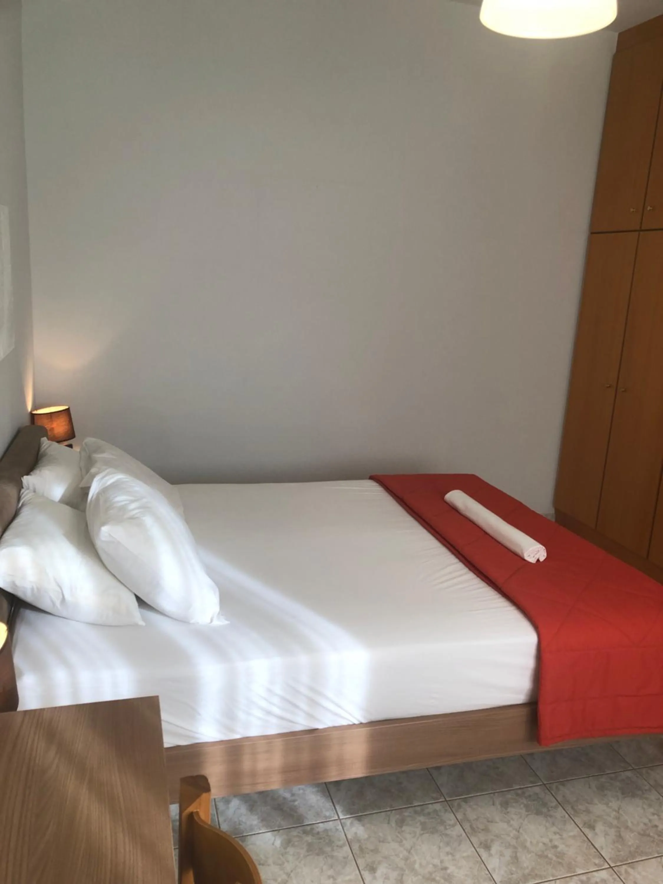 Bed in Chrisanthi Studios & Apartments