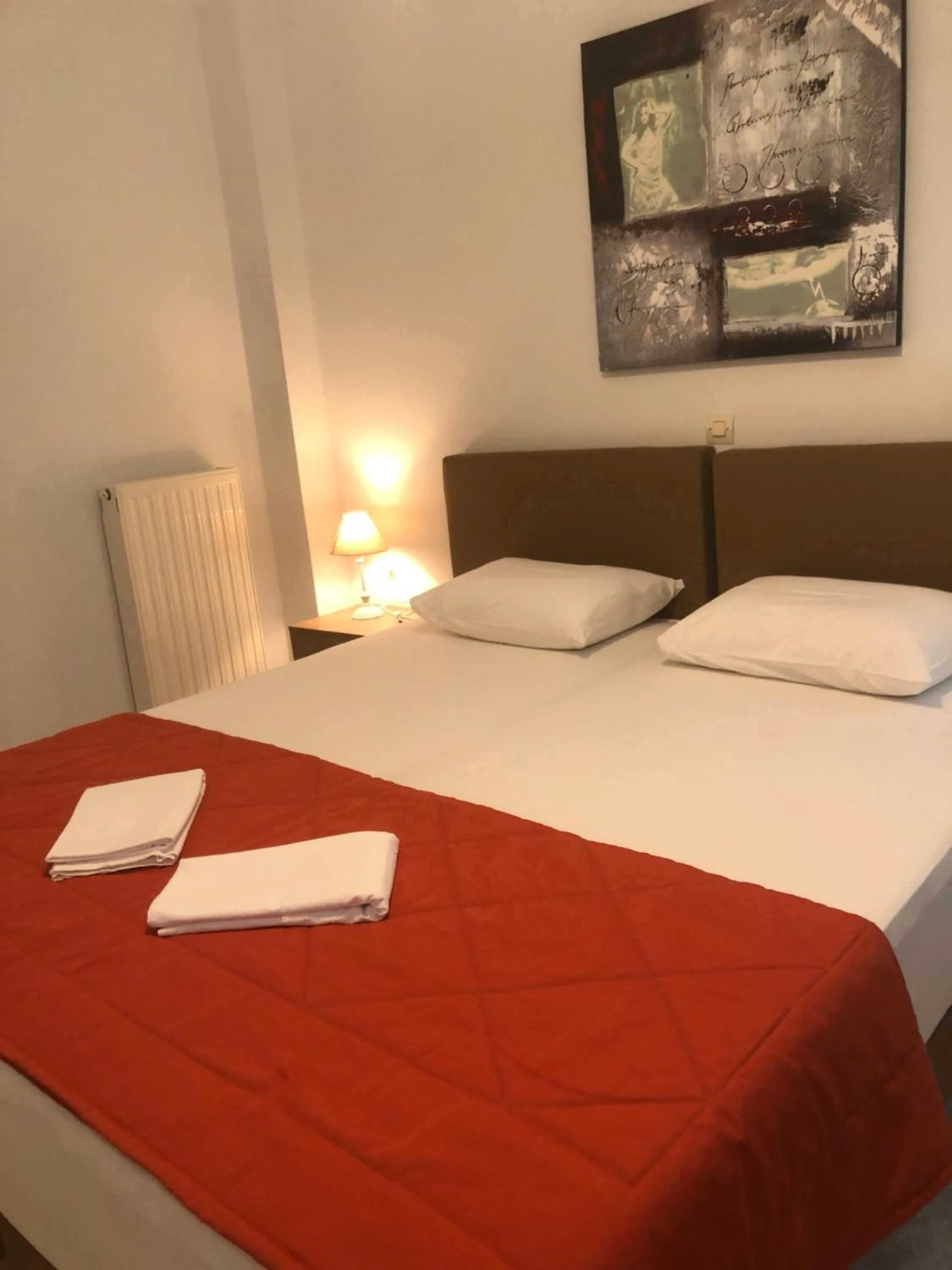 Bed in Chrisanthi Studios & Apartments