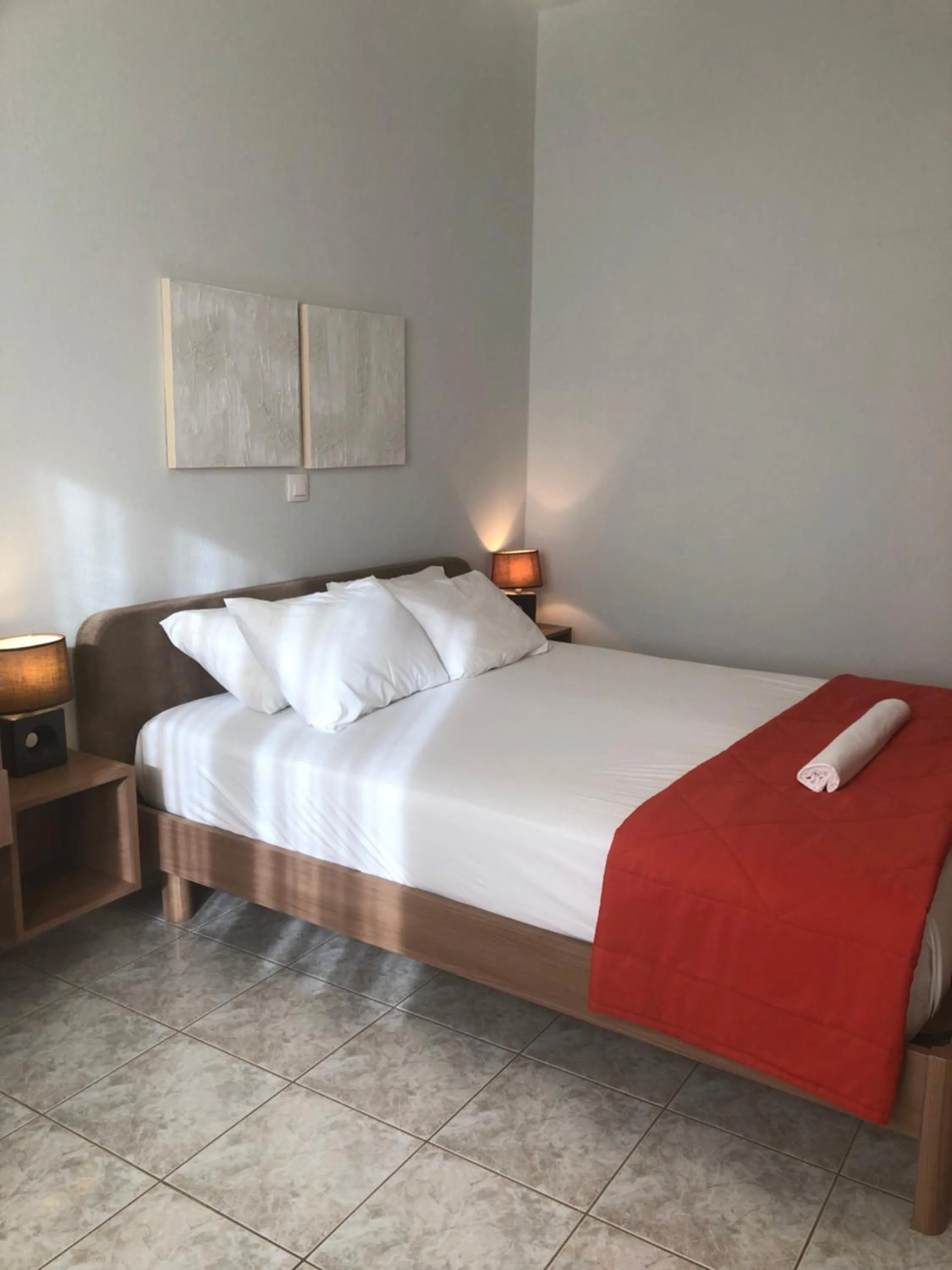 Bed in Chrisanthi Studios & Apartments