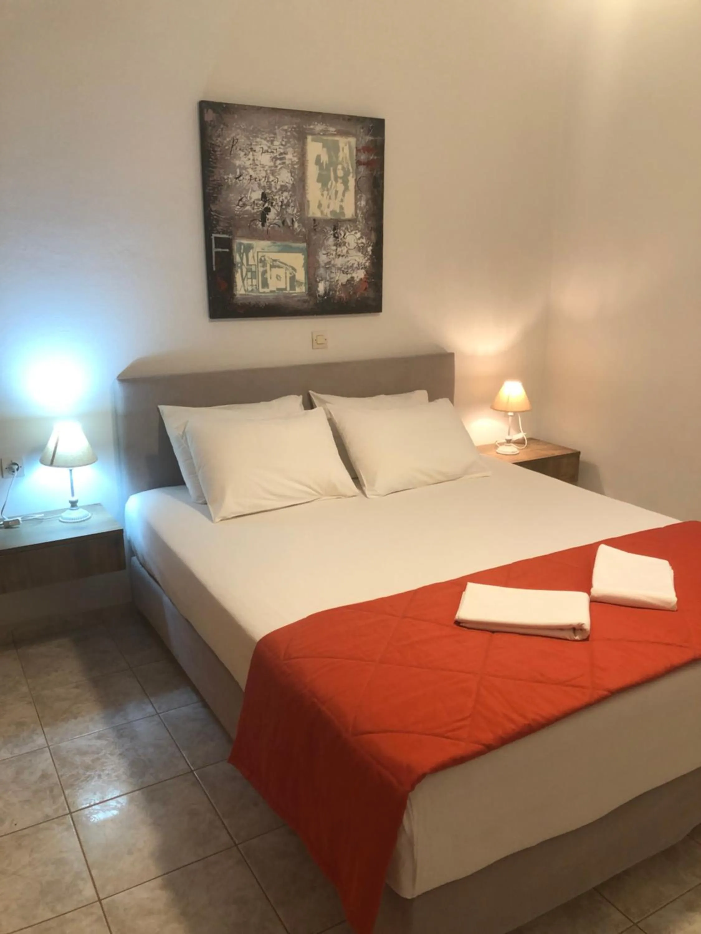 Bed in Chrisanthi Studios & Apartments