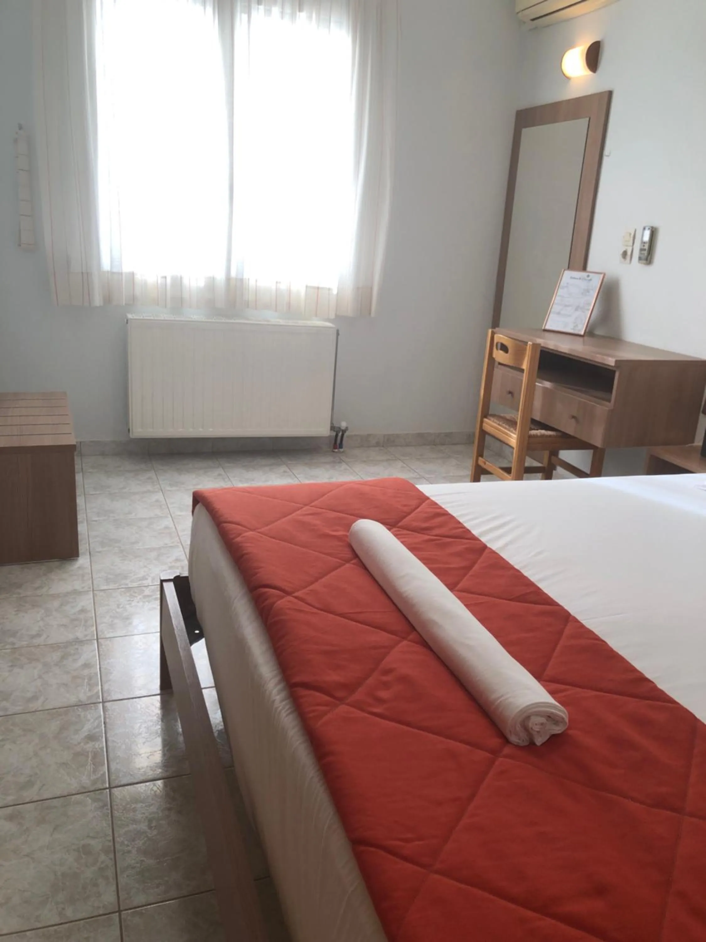 Bed in Chrisanthi Studios & Apartments