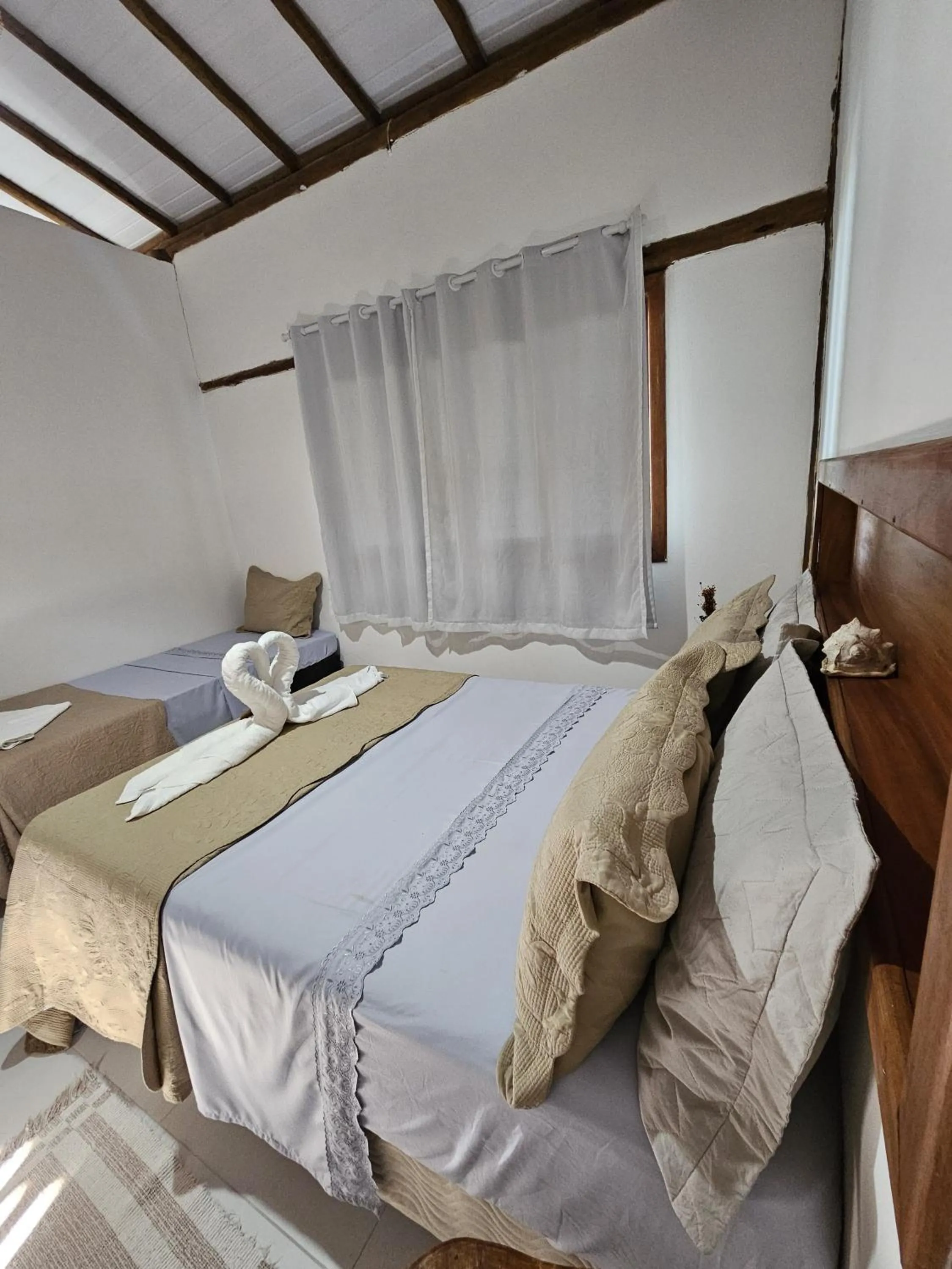 Bed in Pousada Maré