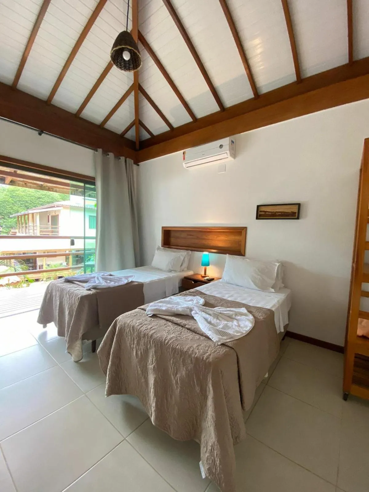 Bed in Pousada Maré