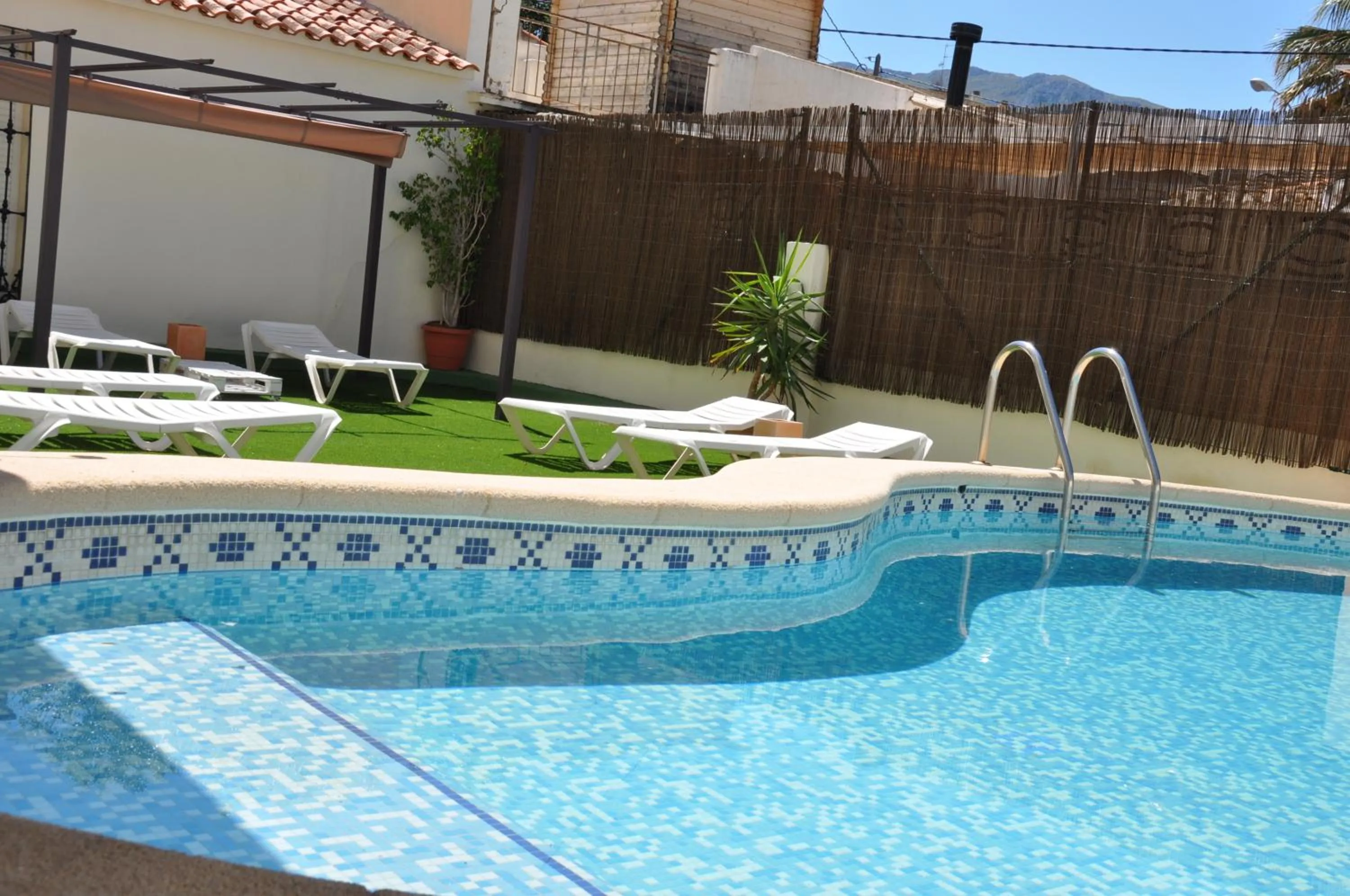 Swimming pool in Apartamentos Acuario
