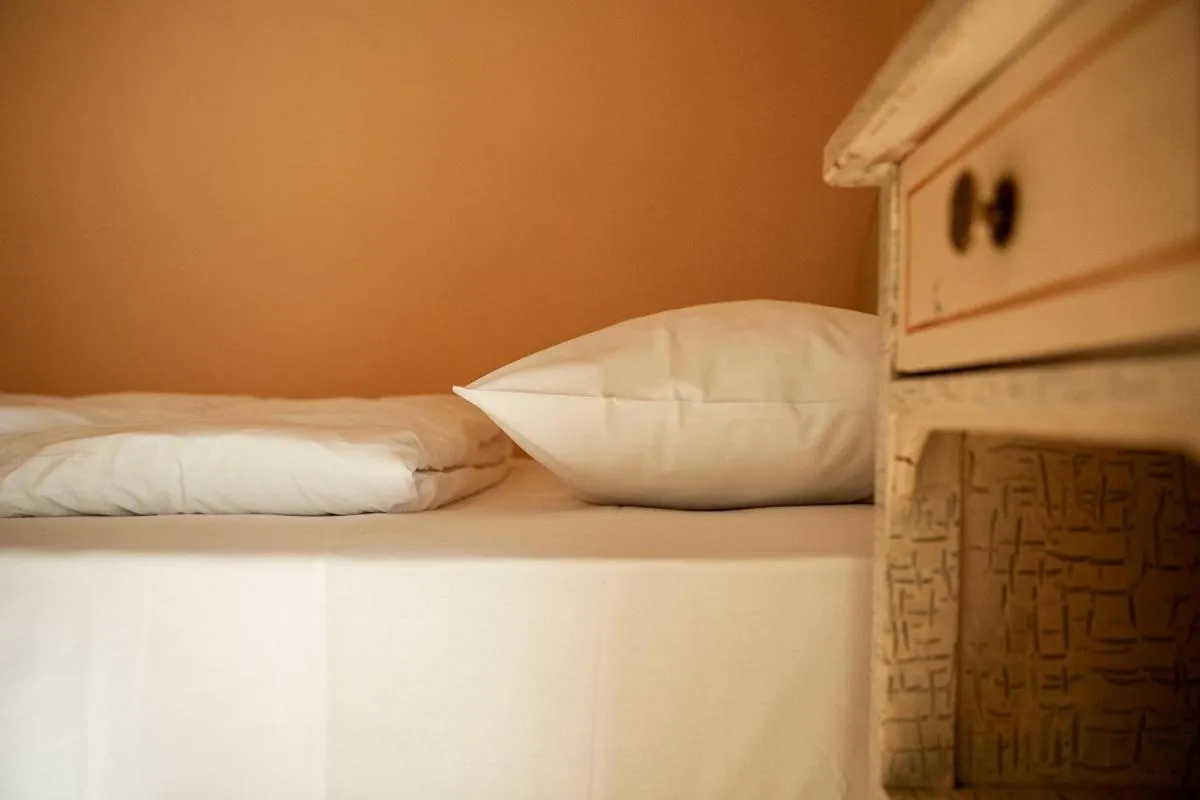 Bed in Belvedere Dolomites Flower Hotel