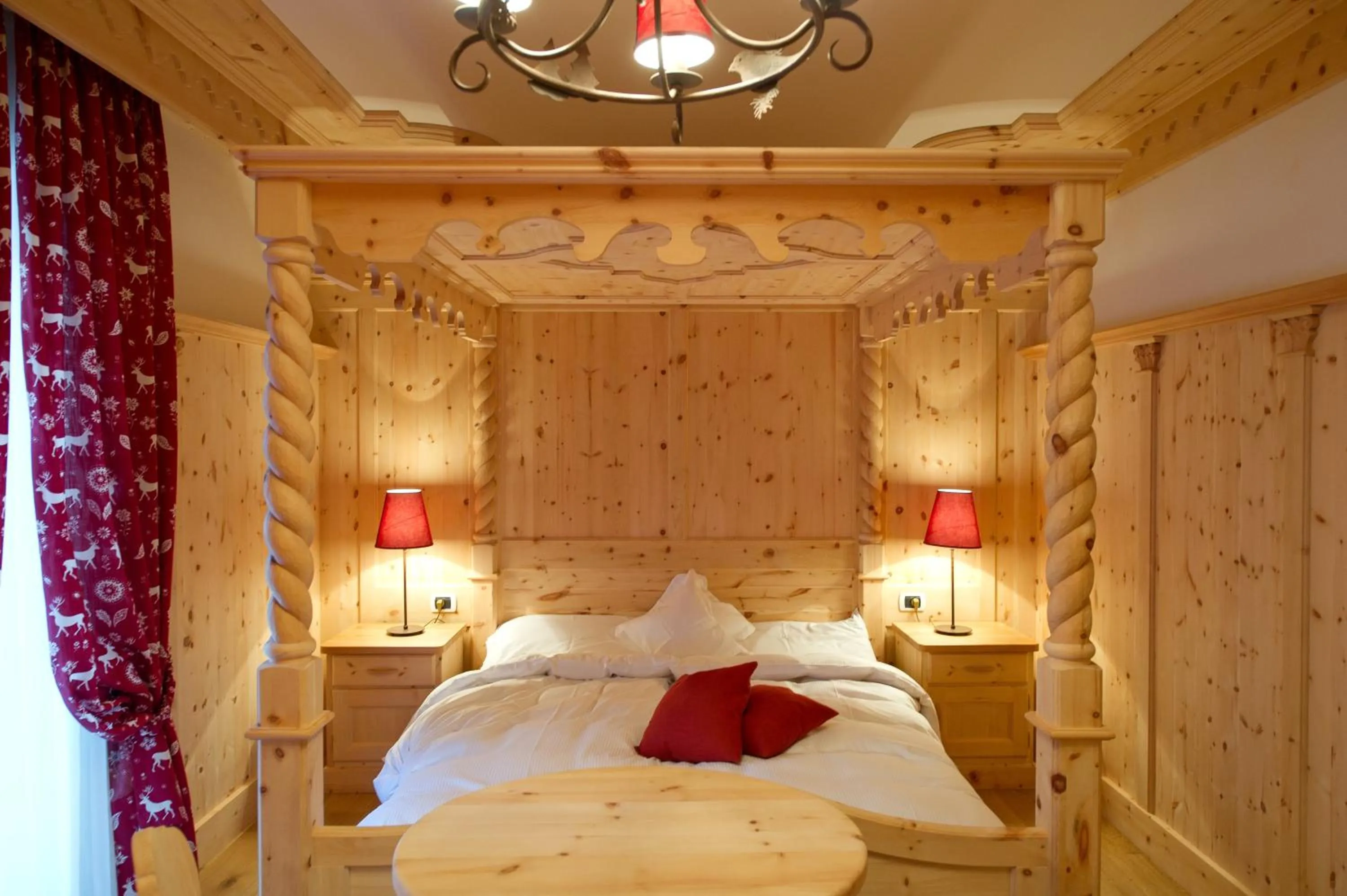 Bed in Belvedere Dolomites Flower Hotel