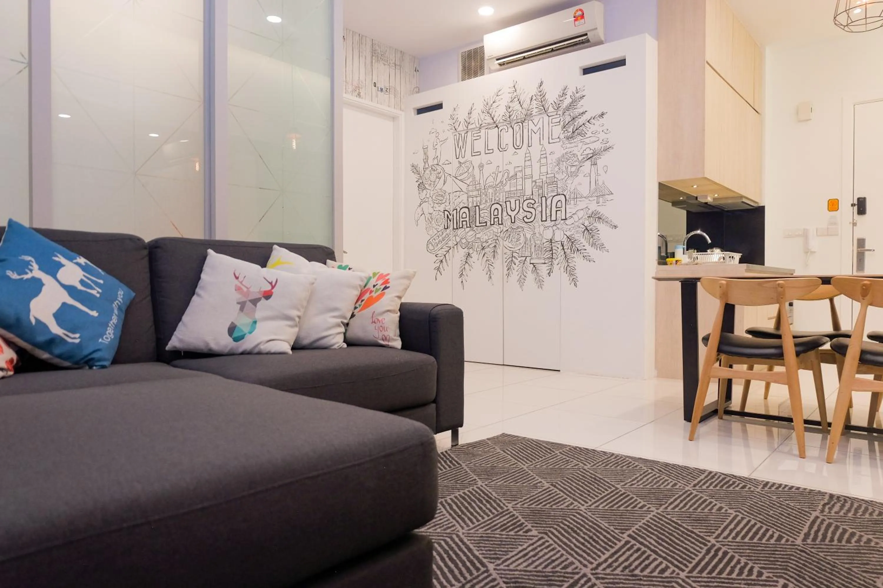 Living room in The Robertson Bukit Bintang by Wowhome