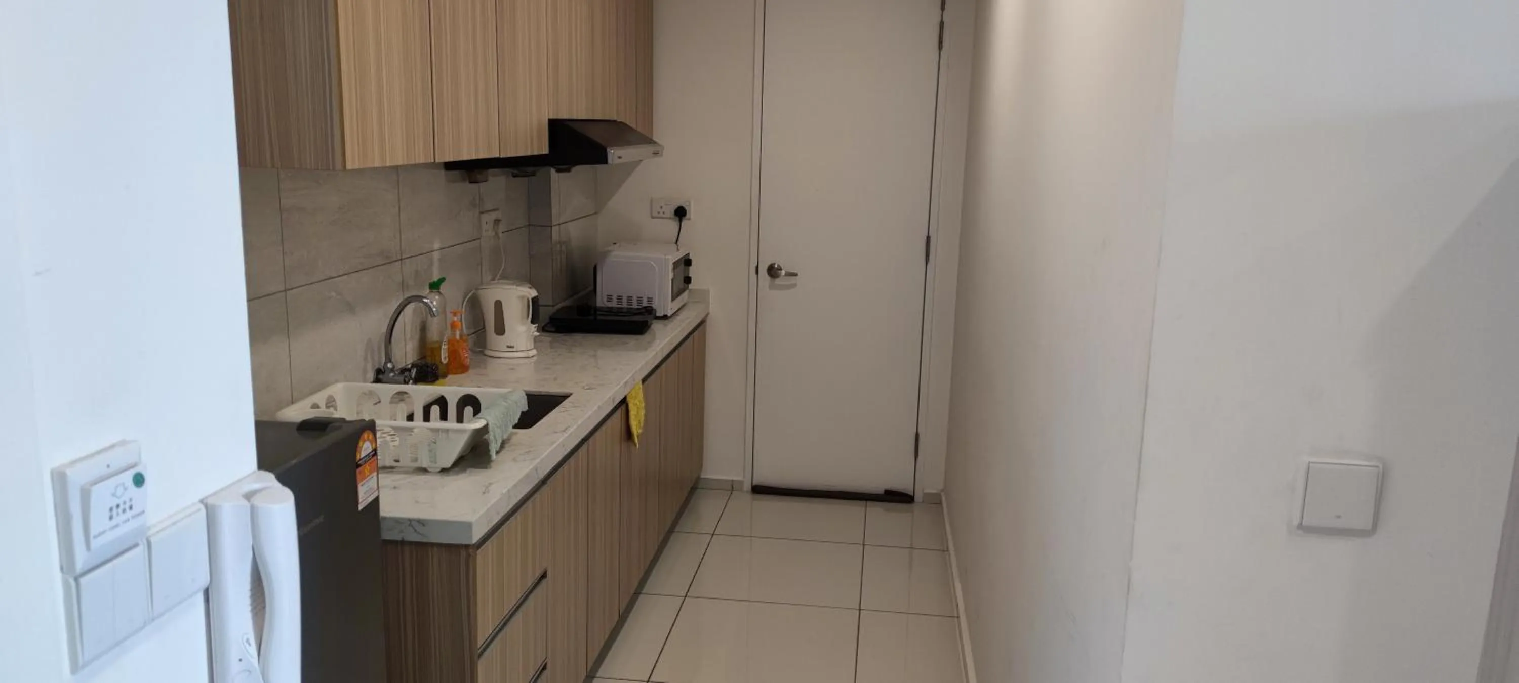 Kitchen or kitchenette in The Robertson Bukit Bintang by Wowhome