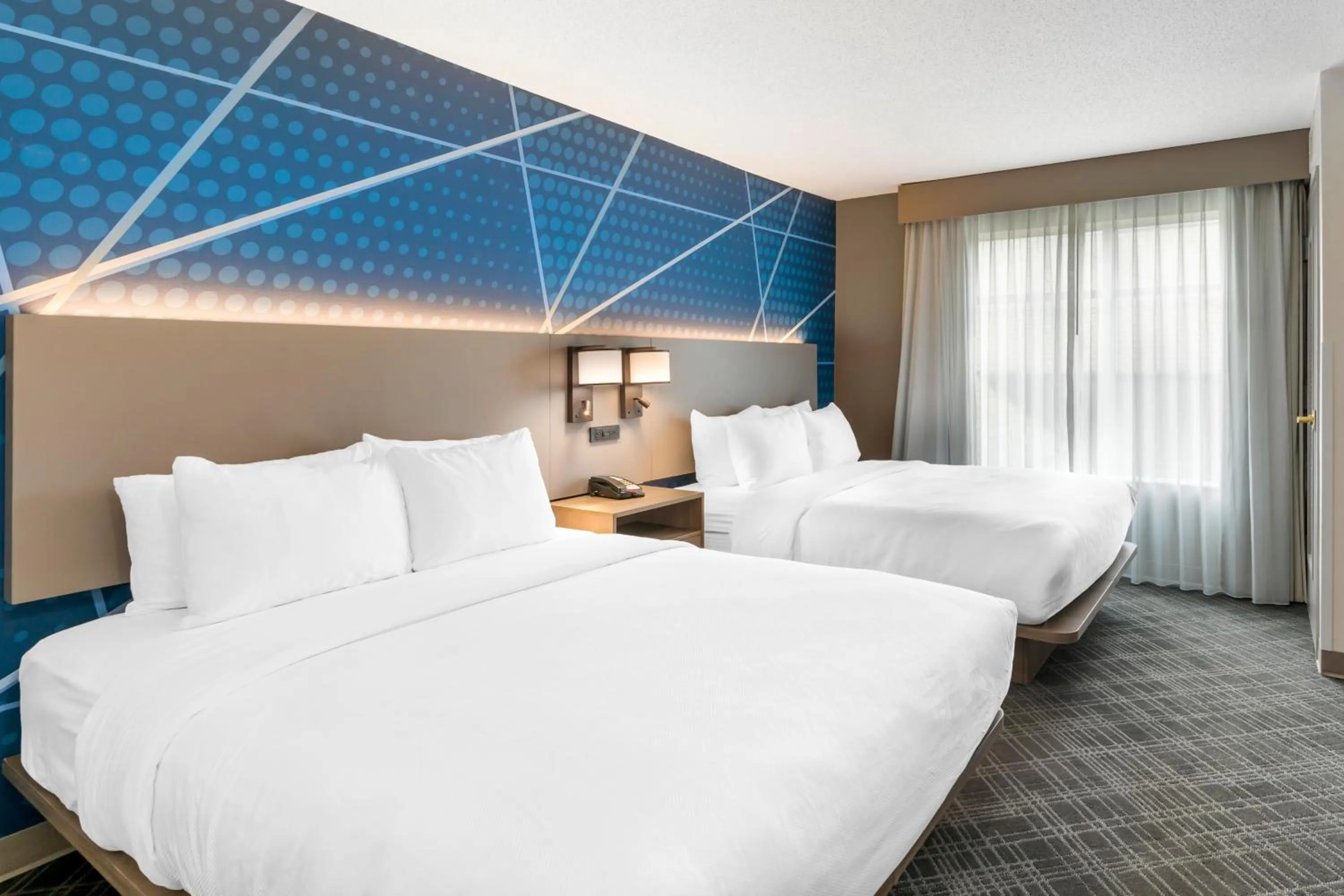 Bedroom, Bed in Comfort Inn & Suites Hampton near Coliseum