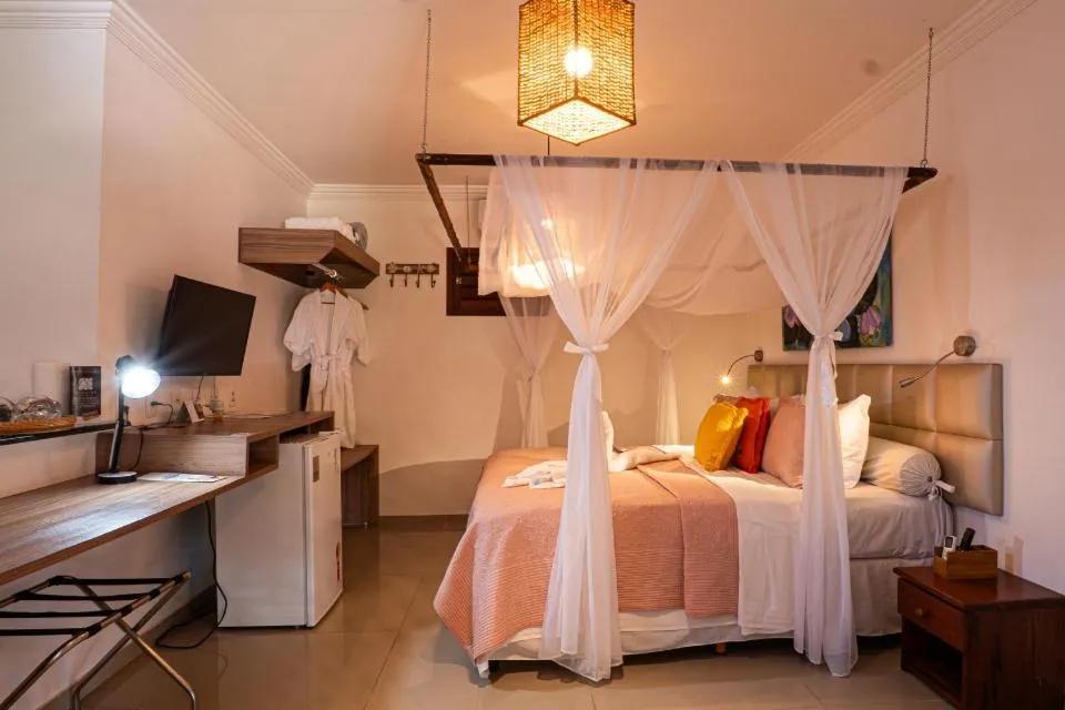 Bed in Xamã Senses - Hotel Pousada