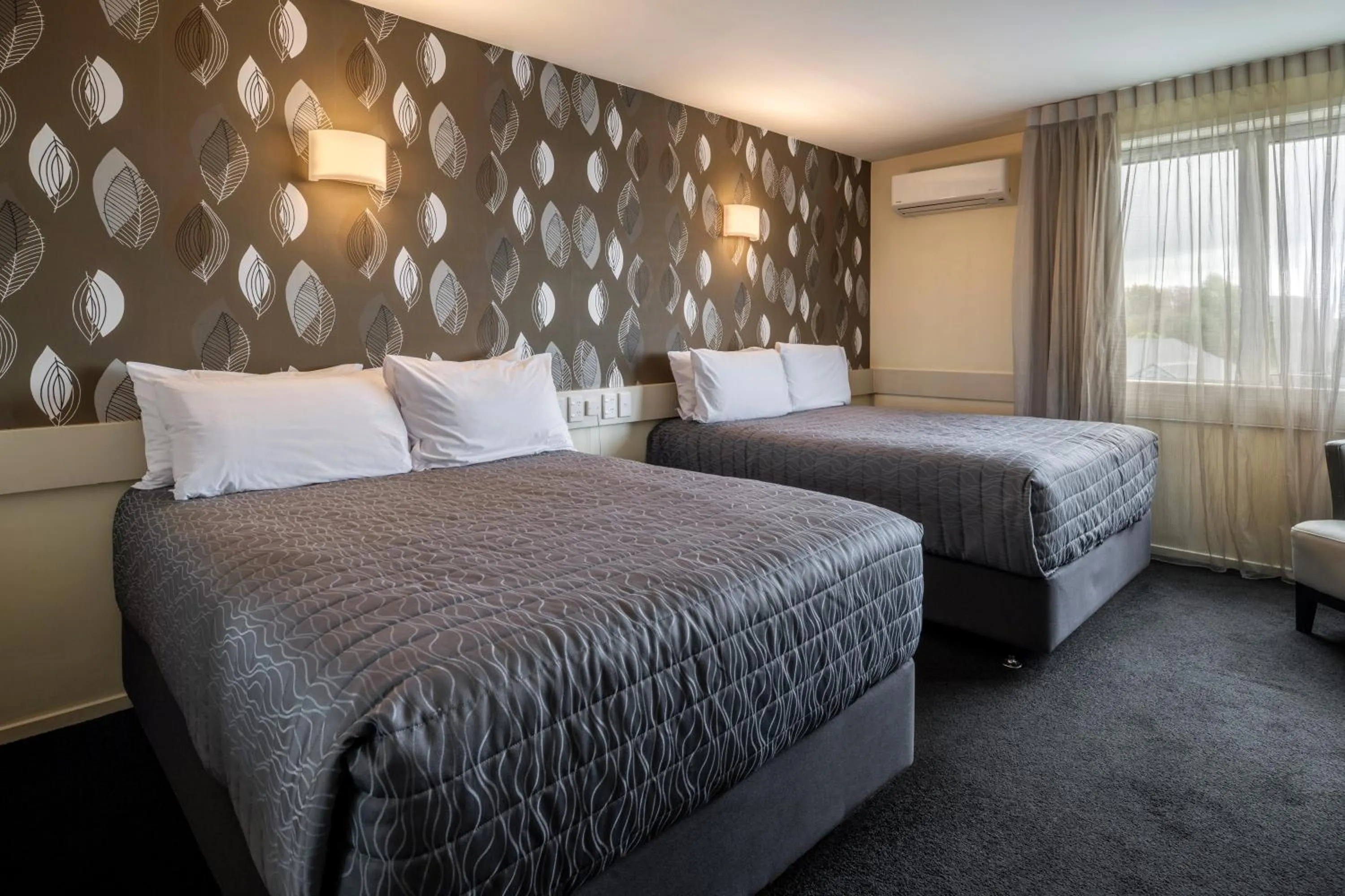 Bed in Hotel Elms Christchurch, an Ascend Collection Hotel