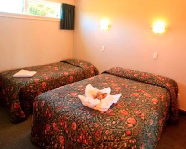 Bed in Blue Dolphin Motel