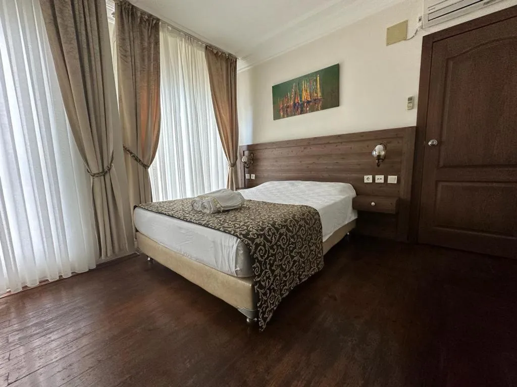 Bed in Paperon Butik Otel