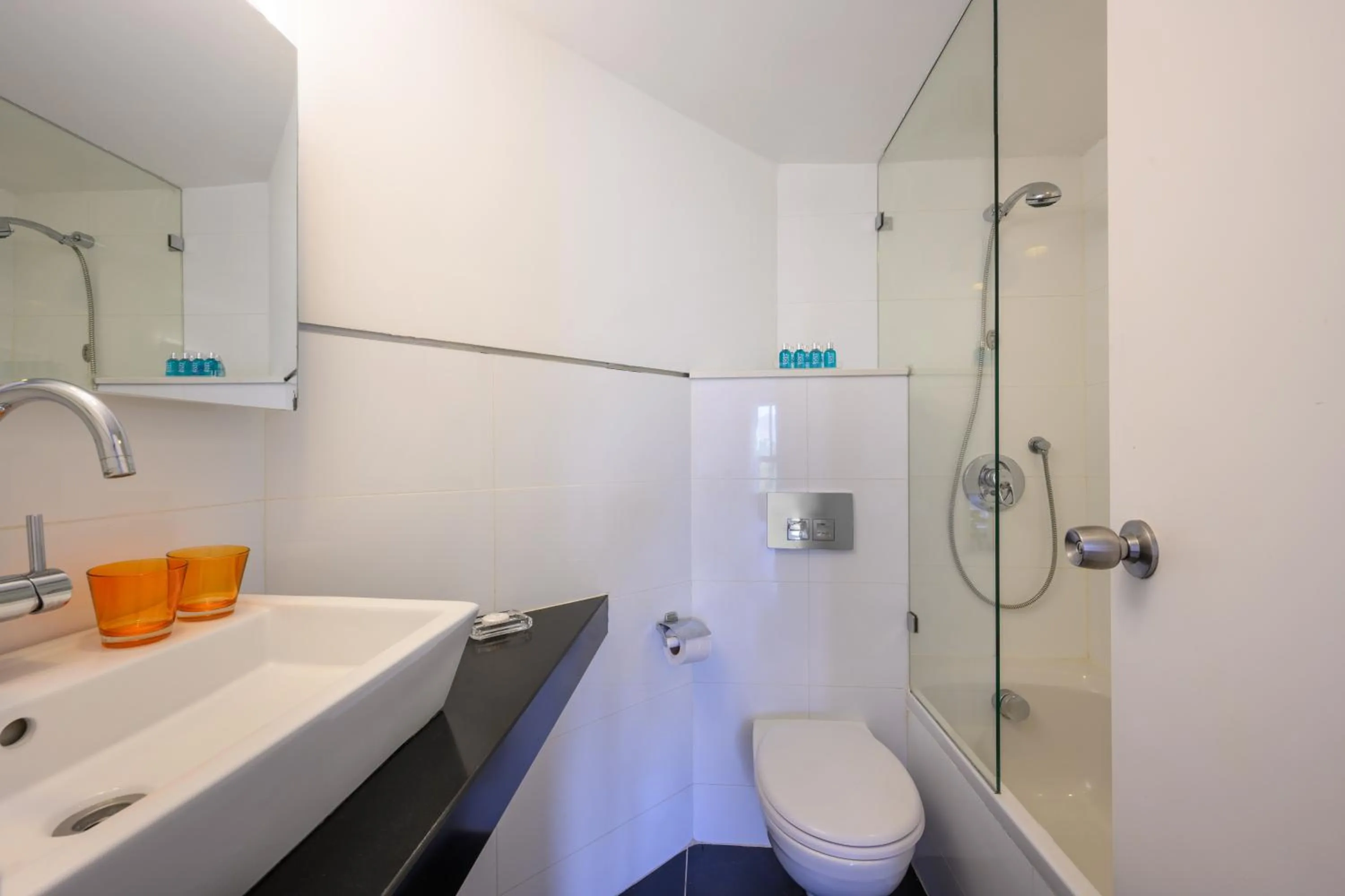 Bathroom in Riviera by Isrotel Collection