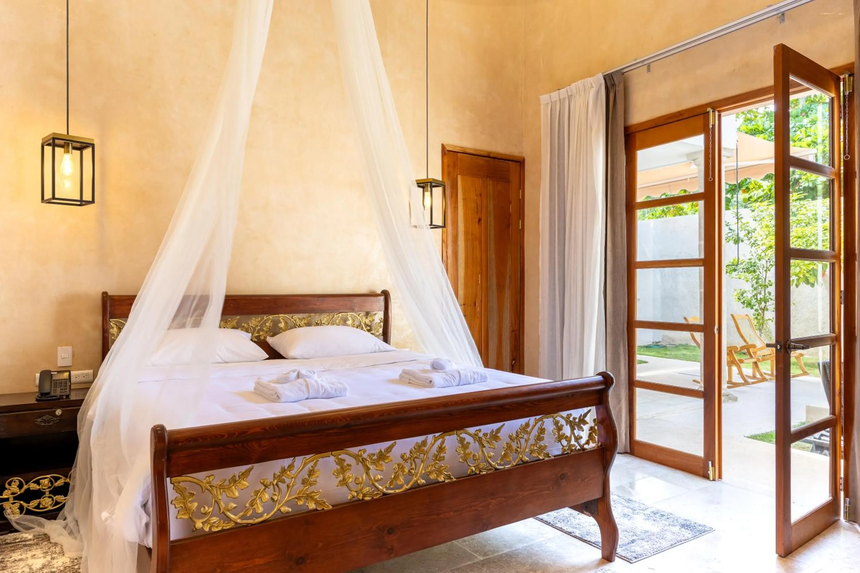 Bed in Hacienda Cenote San Ignacio