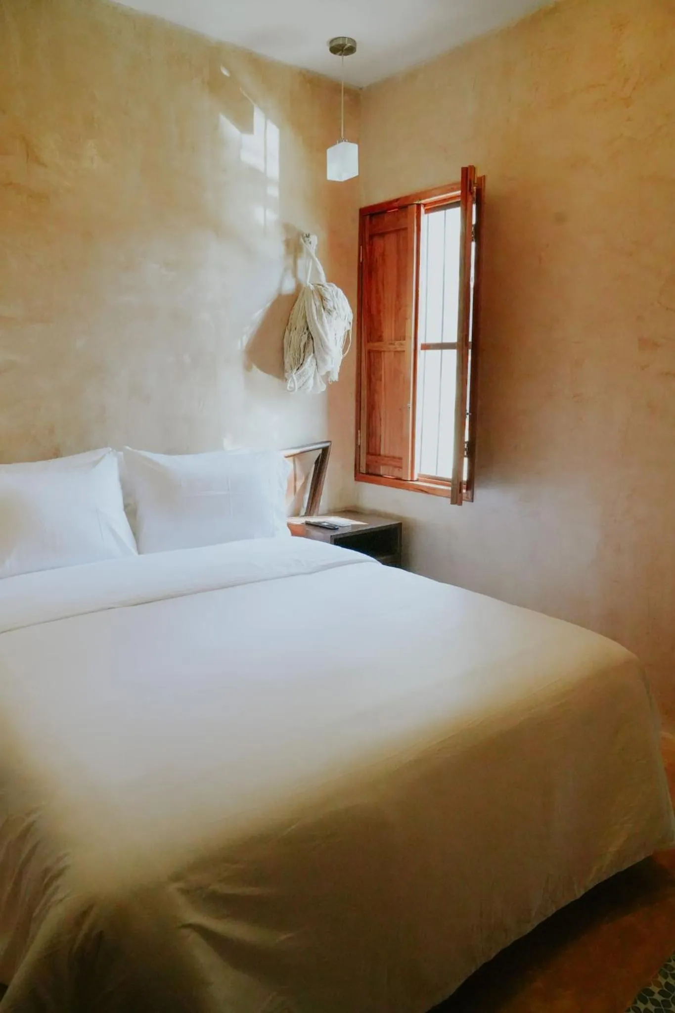 Bed in Hacienda Cenote San Ignacio